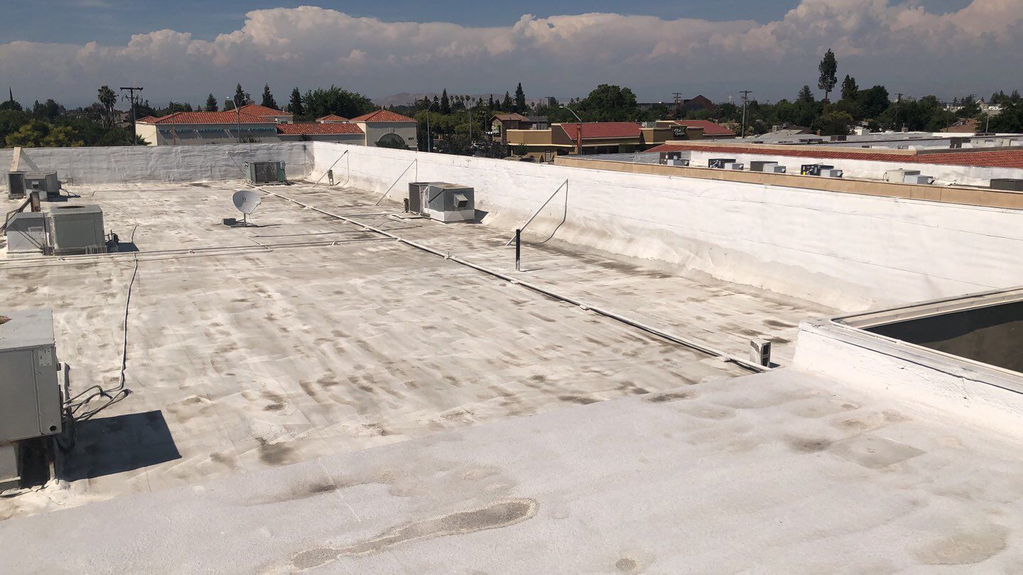 Reburbish existing spray foam job by Straight Edge Roofing Inc