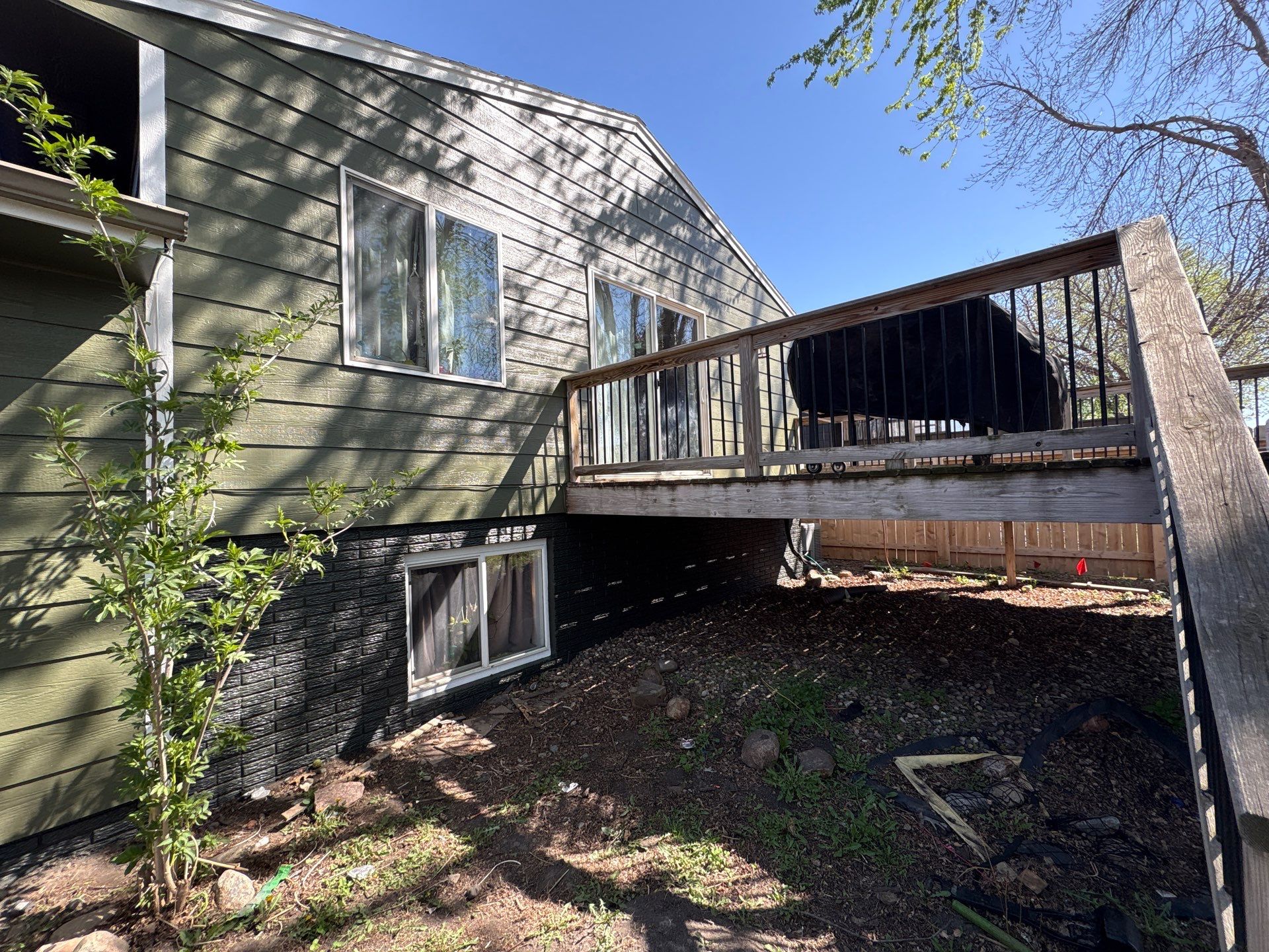 Full Exterior House Painting and Foundation Refinishing in Sioux Falls by Select Painting, Coatings & Garage Cabinets