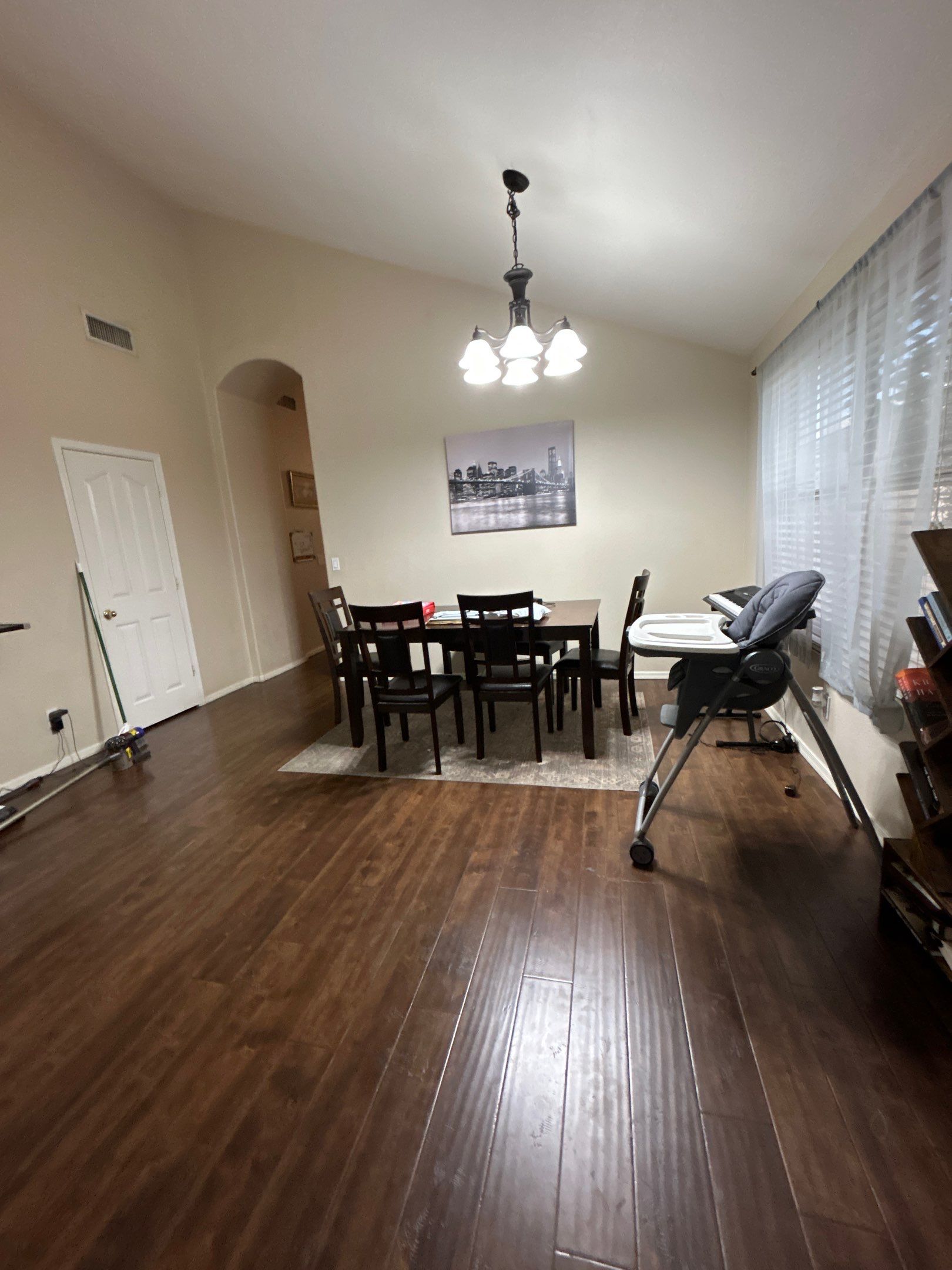 Chandler Dining Room Update with Dark Wood Laminate Flooring by CompanyCam Sales Demo