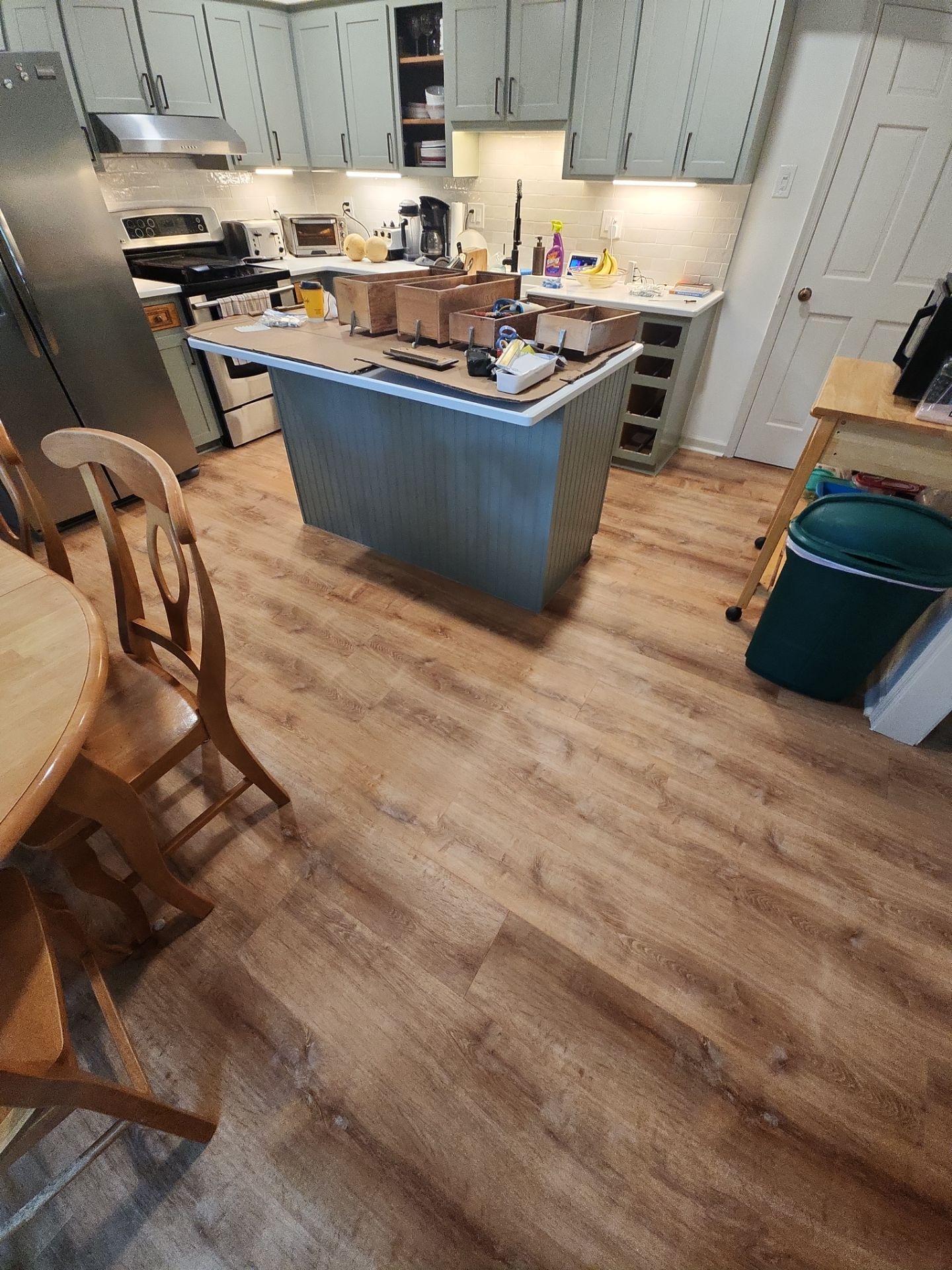 A Pathway to Personality – A Two-Tone Kitchen Transformation in Apex by Elite Remodeling and Design LLC
