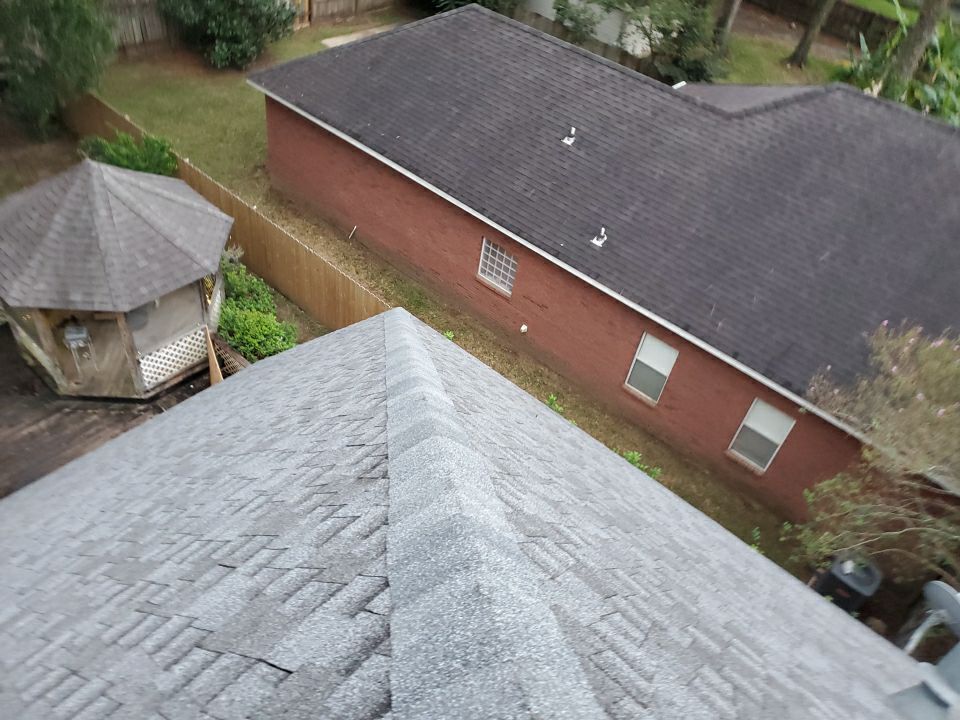 Residential Roofing Installation using Roof Replacement by American Roofing & Construction LLC