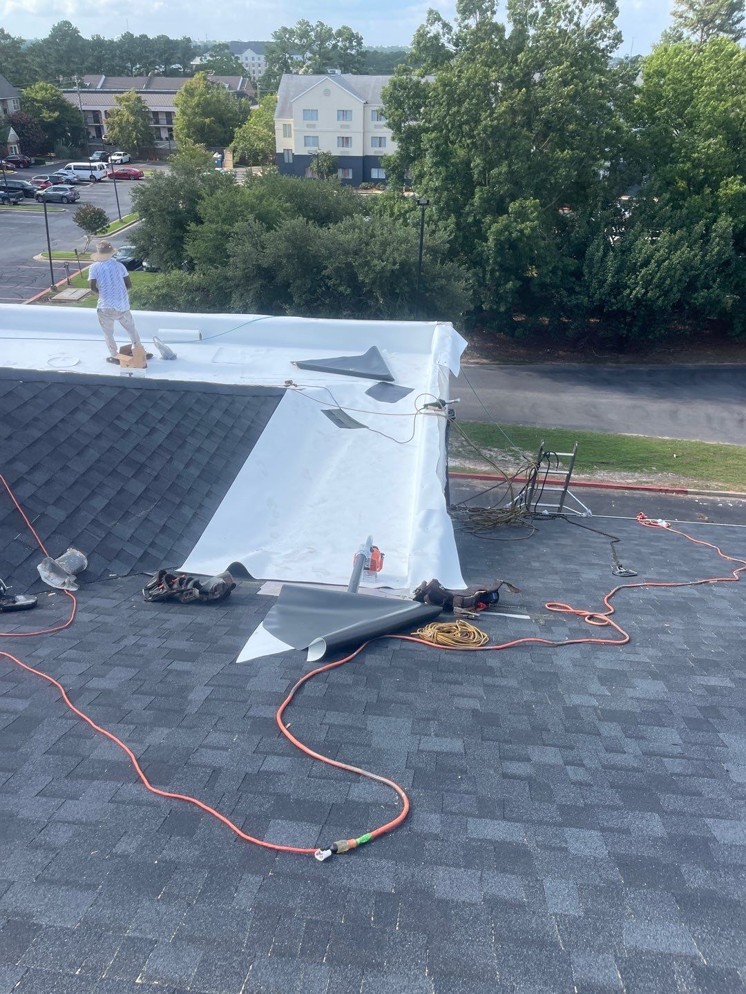 Commercial Roofing Installation using Roof Replacement by American Roofing & Construction LLC