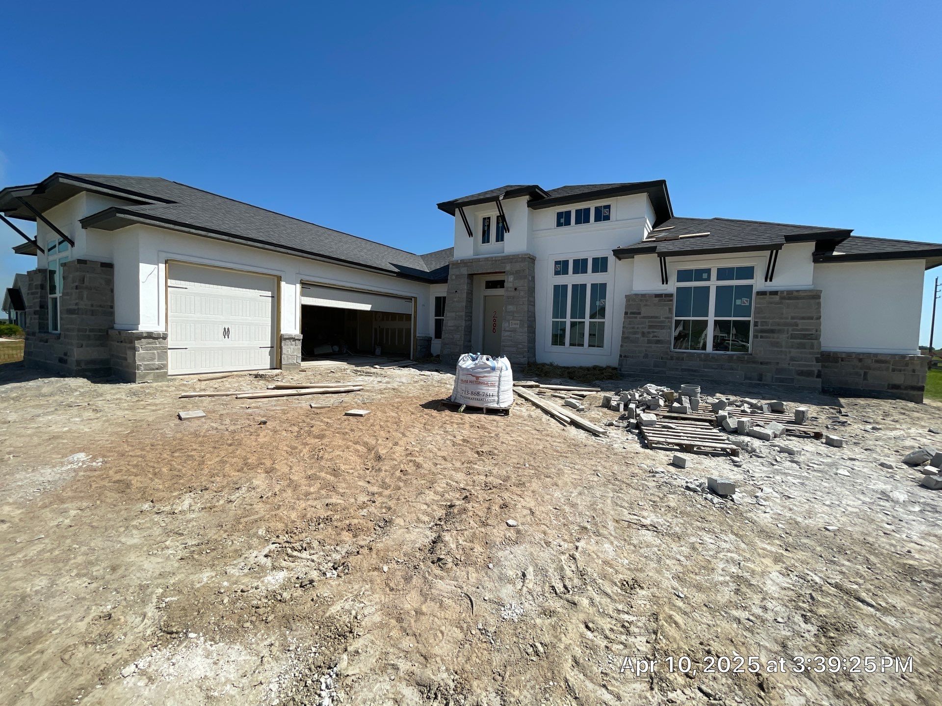 Waller Sophistication: Snowbound Color Stucco with Limestone Accents. by Apex Conventional Stucco Llc