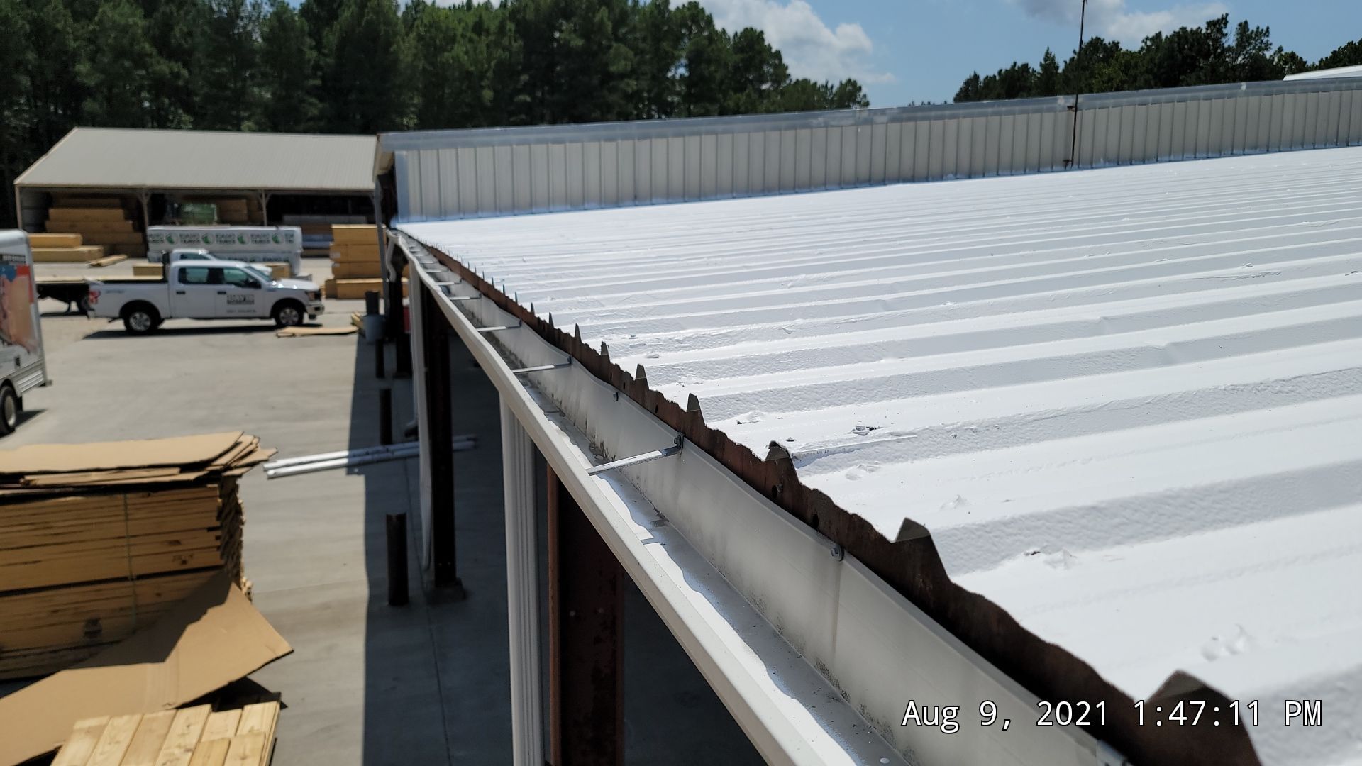 Commercial Roofing Installation using Aldocoat Coatings by Hostetler Roofing