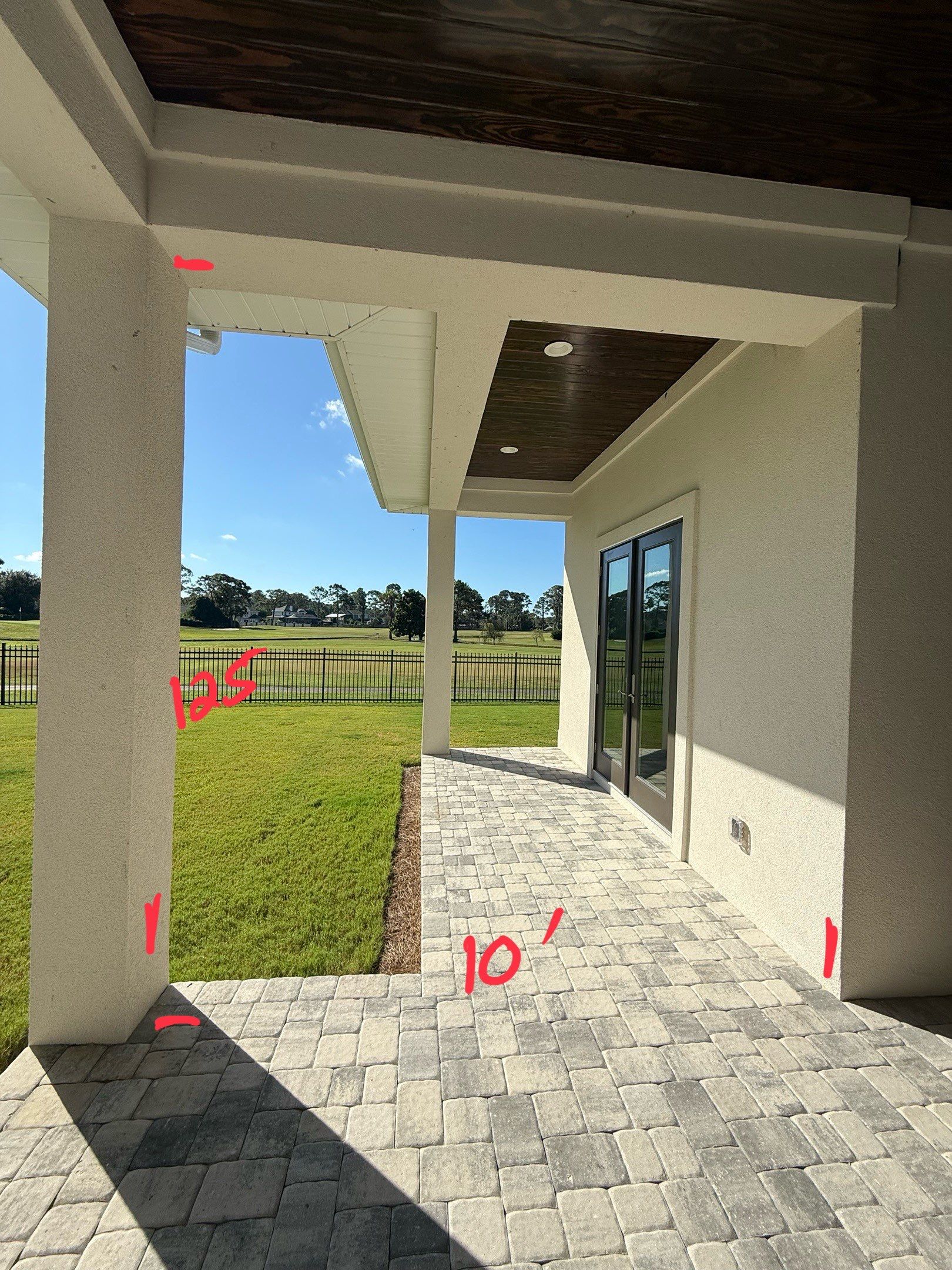 Motorized Screen and Solar Shade Installation in Panama City Beach by Brannan Aluminum Inc.
