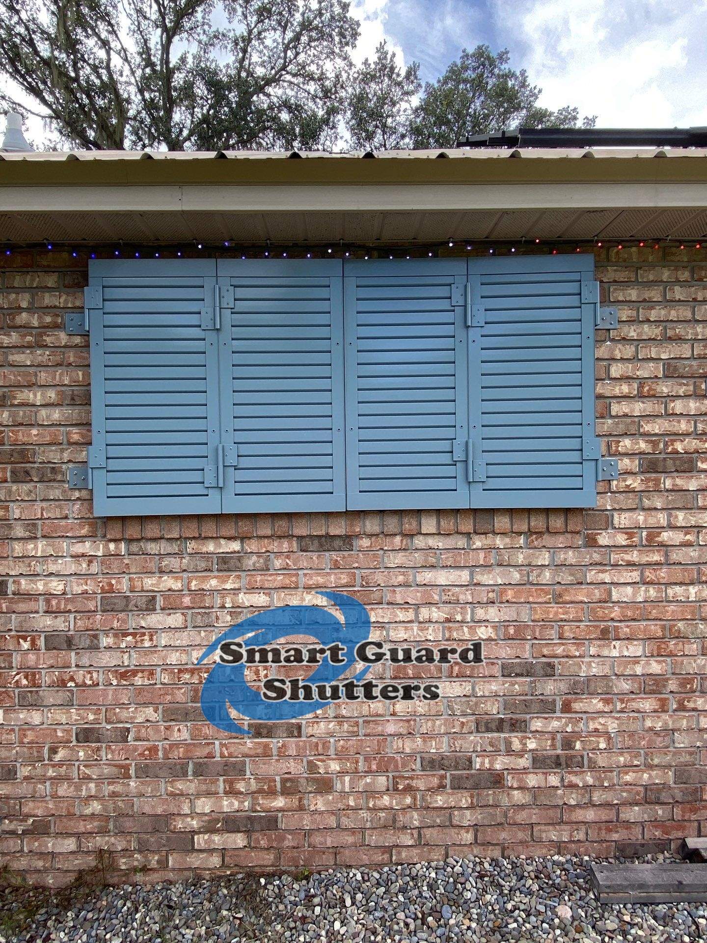 Impact Colonial Shutters in Squirrel Grey by Smart Guard Shutters