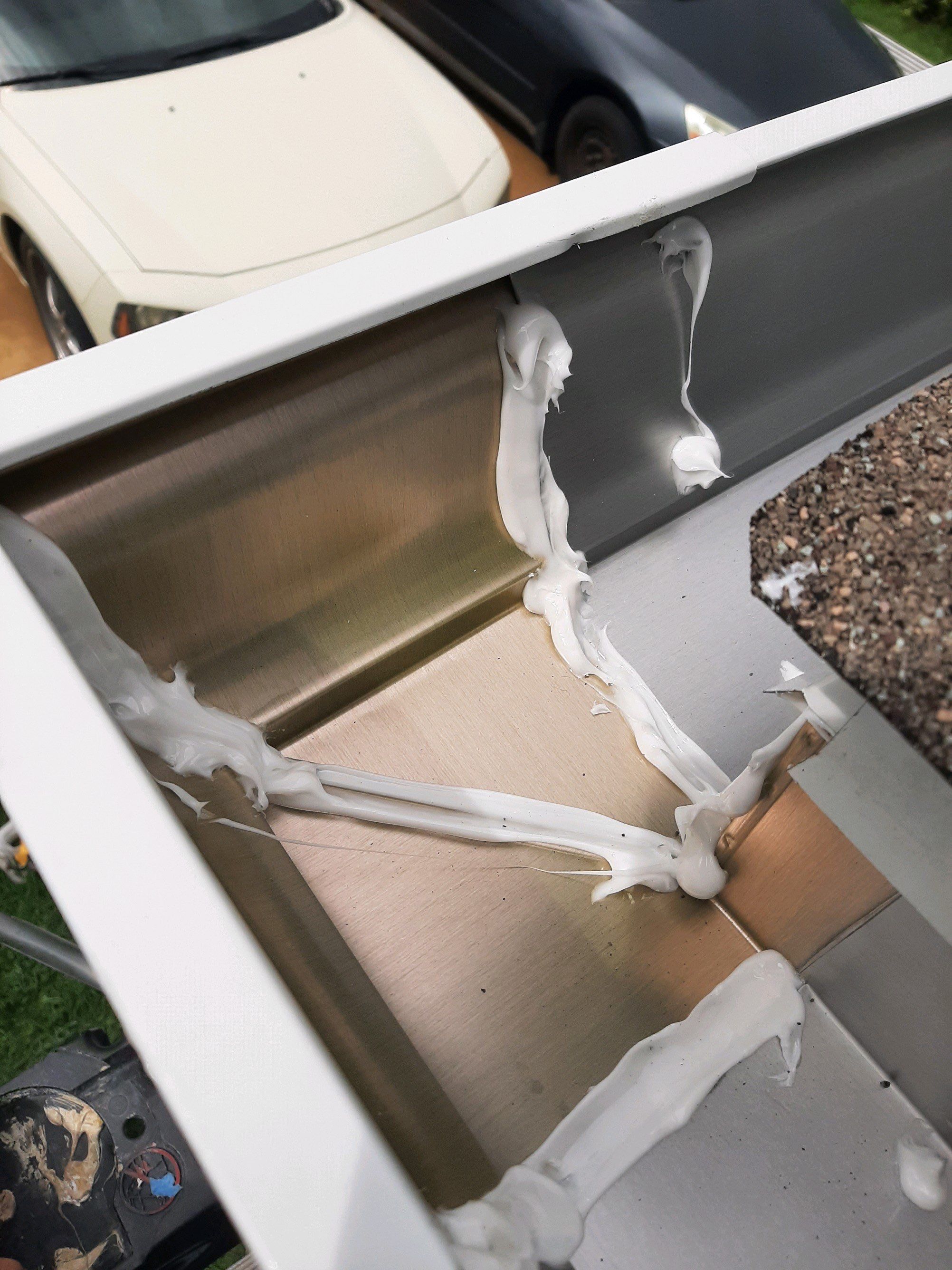 Seamless Gutter Installation using White K-Style Gutters by Gutter Professors