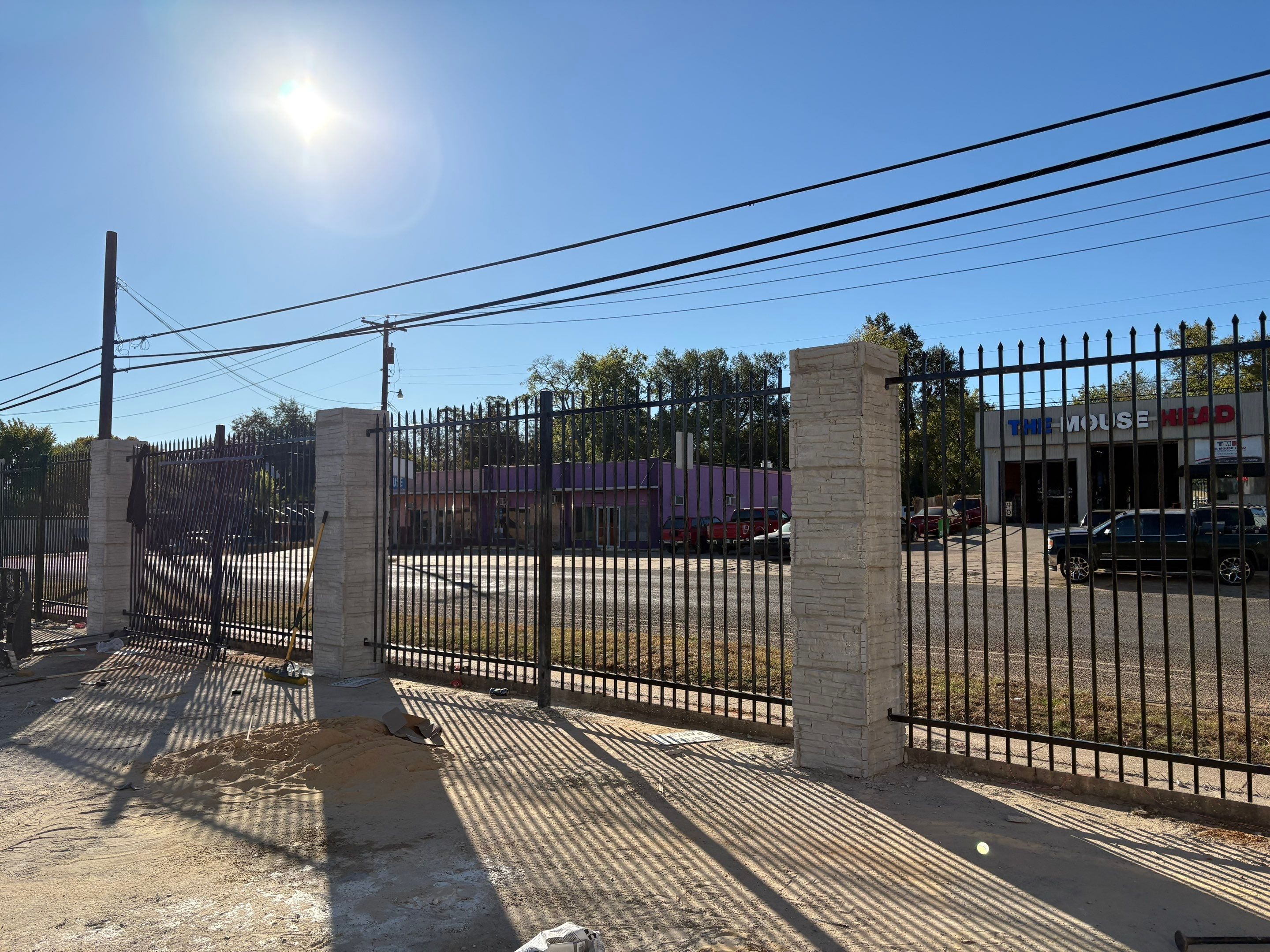 Commercial Fencing - Wrought Iron with Concrete columns by 3:16 Roofing and Construction