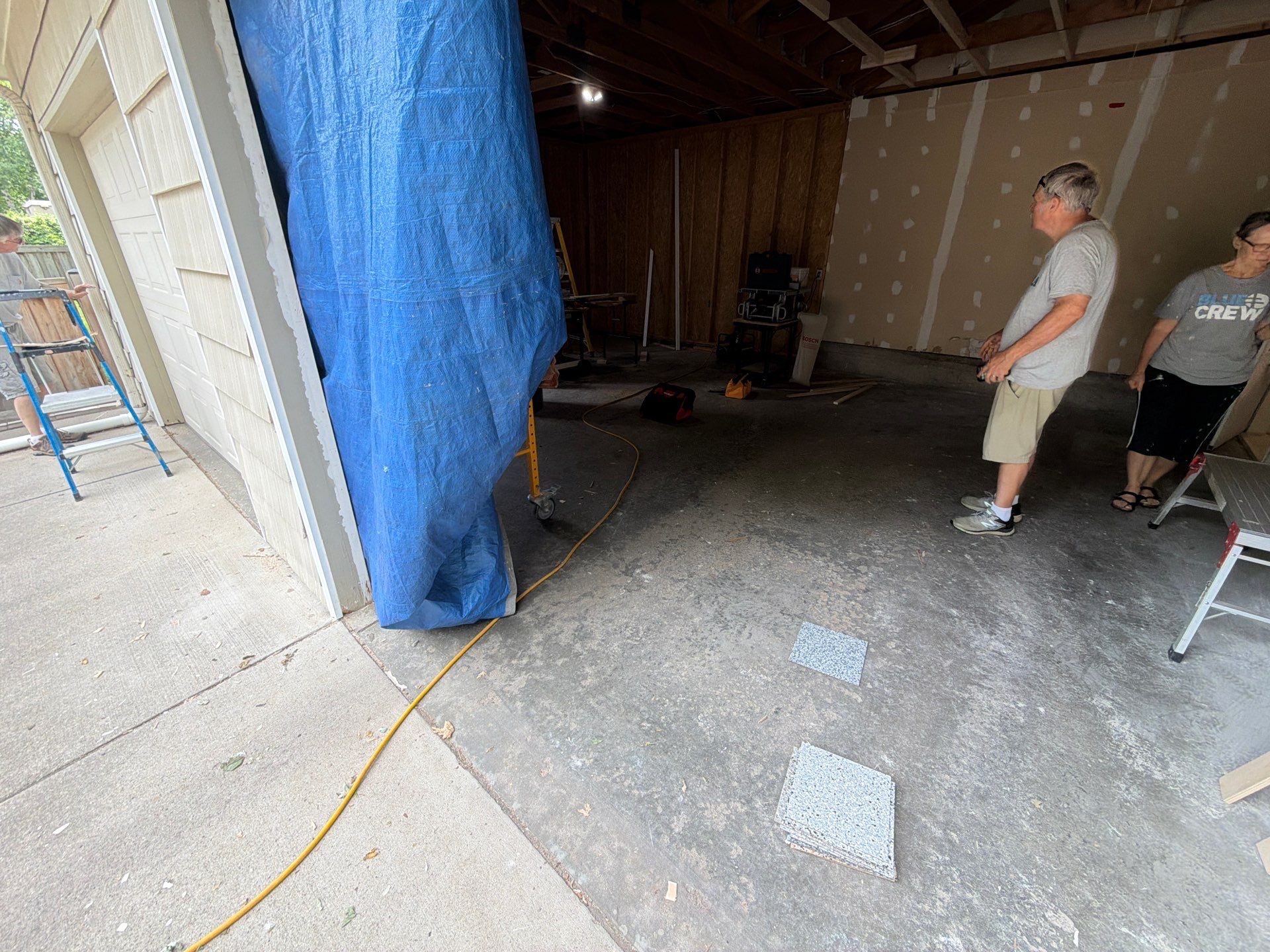 Epoxy Concrete Coating and Garage Floor Restoration in Sioux Falls by Select Painting, Coatings & Garage Cabinets