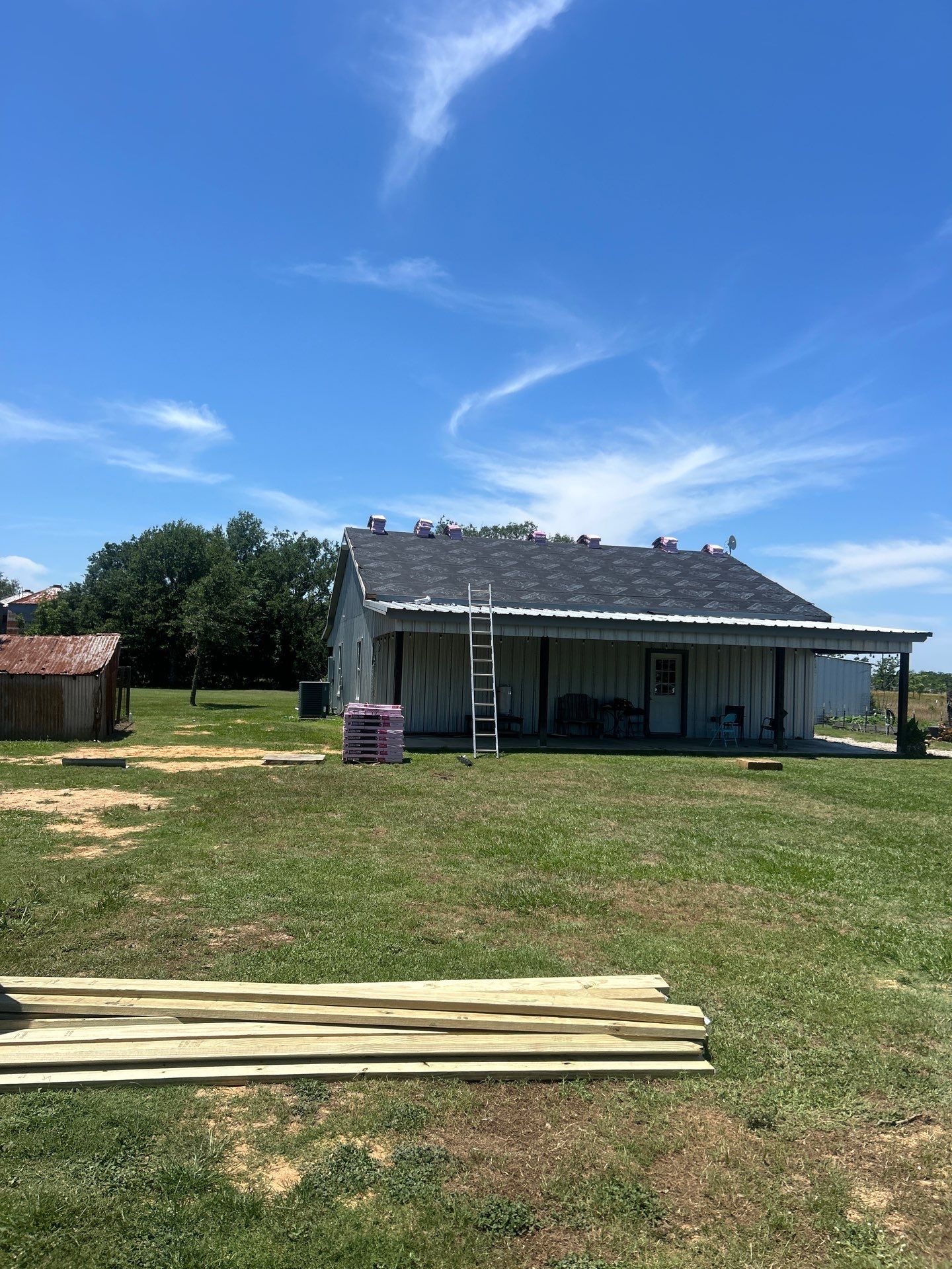 Residential Roofing Installation using Metal by Roof Repair Company