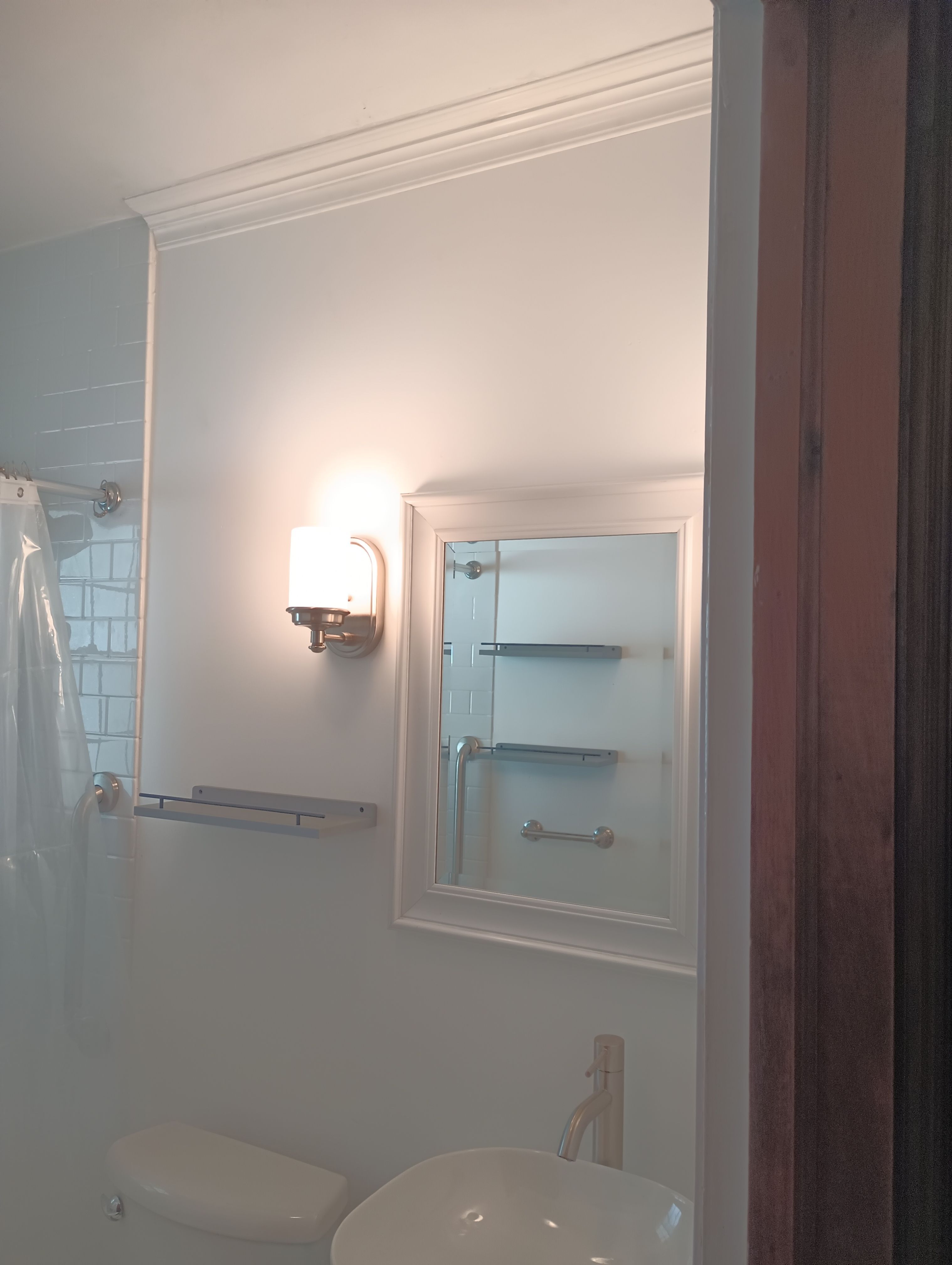 Tub to Shower Conversion using BCI Acrylic Shower System by Secure Construction Company Inc