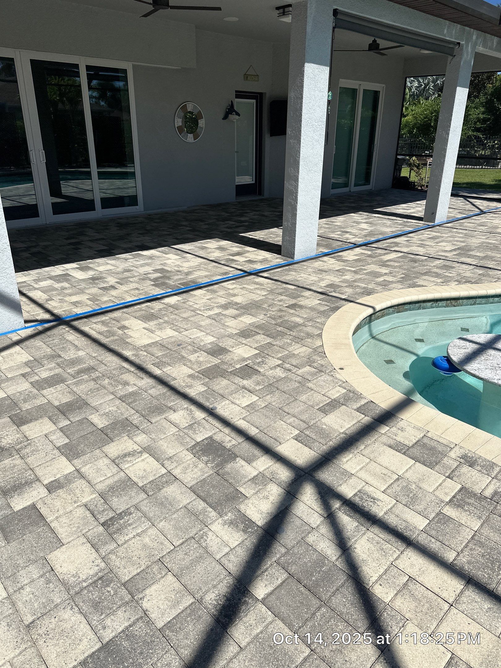 Residential Paver Sealing for Driveway and Pool Deck in La Paloma Sun City Center by Supreme Paver Experts