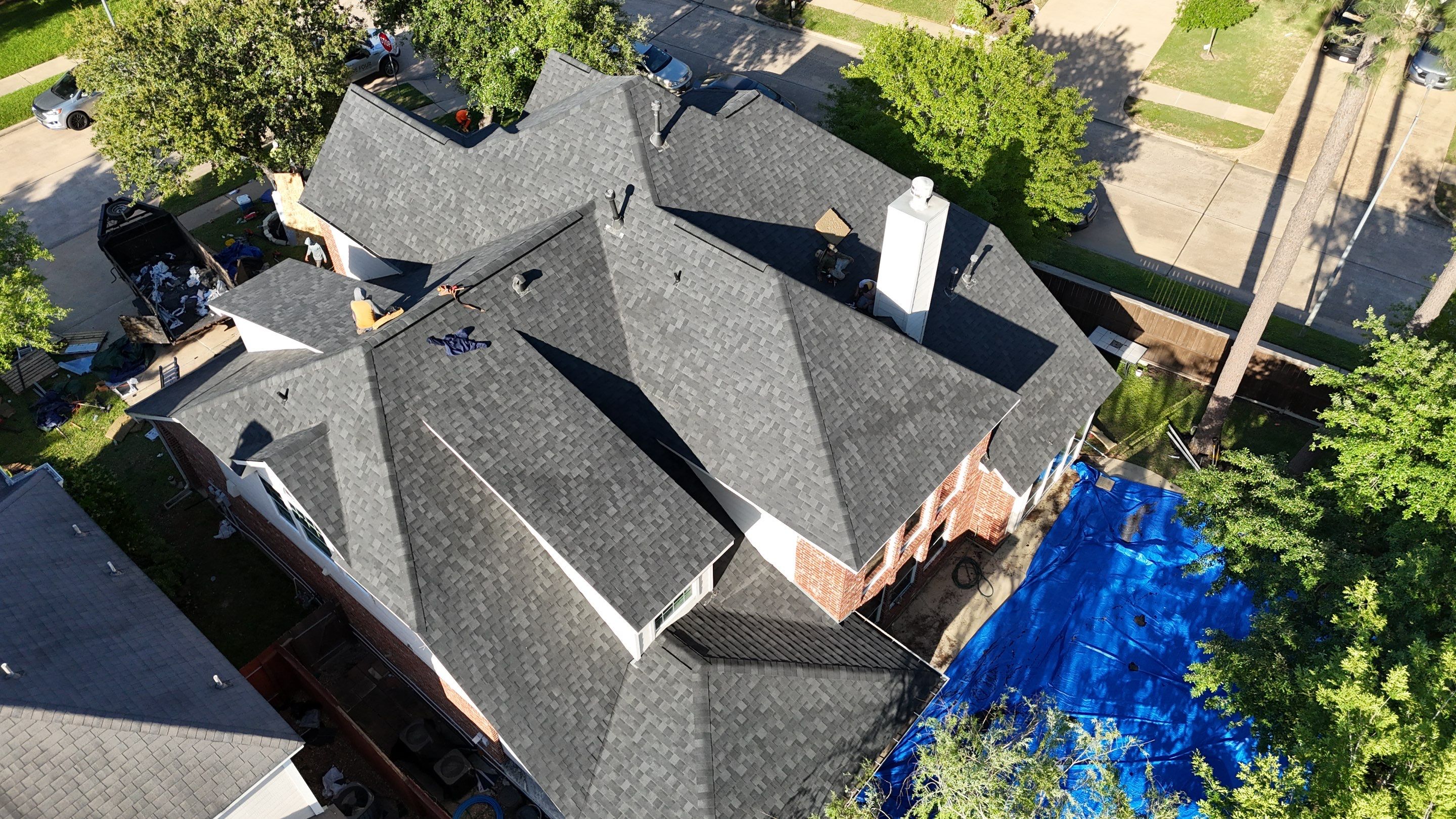 Residential Roofing Installation using Architectural Shingles by Core Four Roofing