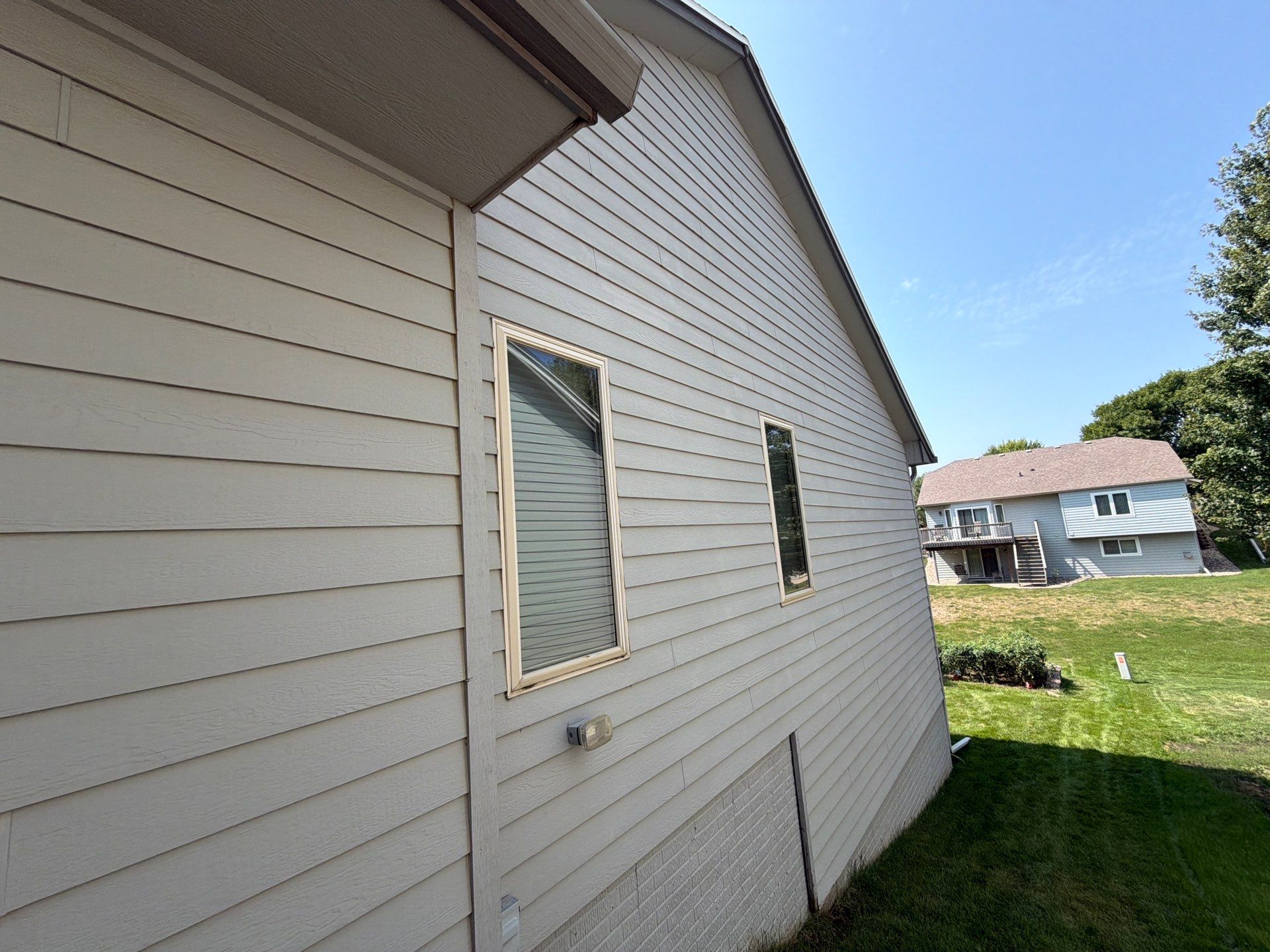 Exterior Painting for Vinyl Siding and Trim in Sioux Falls by Select Painting, Coatings & Garage Cabinets