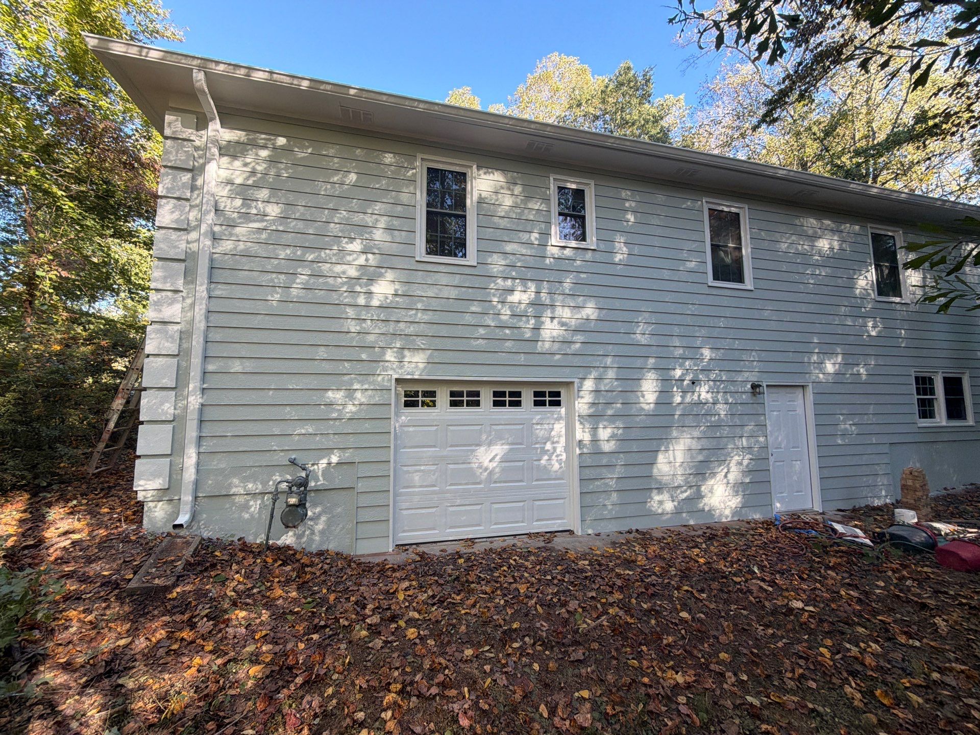 Exterior Residential Painting and Deck Refinishing in Canton, Georgia by Swift Home Renovations 