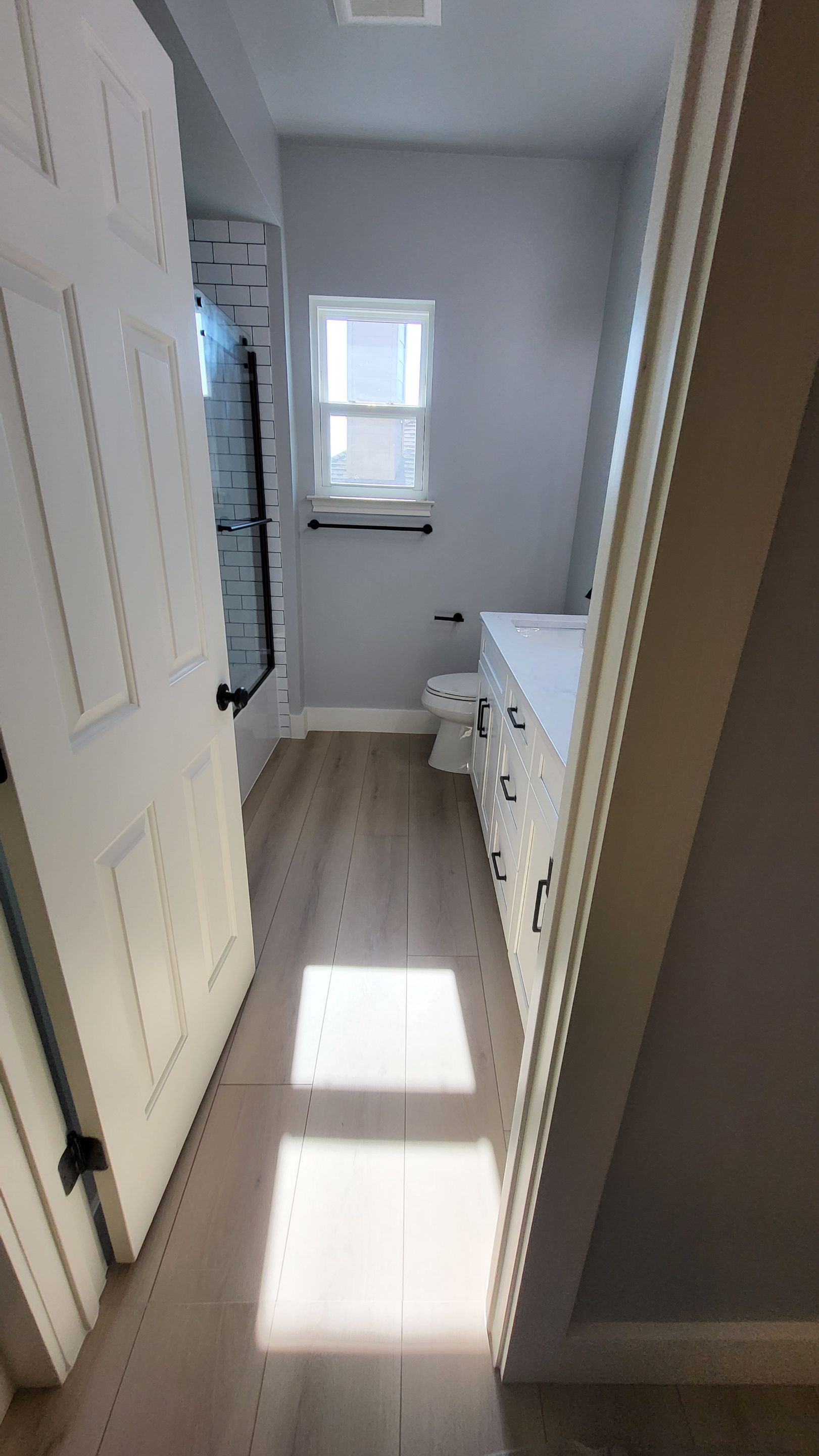 Stone Oak Bathroom Refresh with Modern Subway Tile Before and After by Legacy Bath and Kitchen