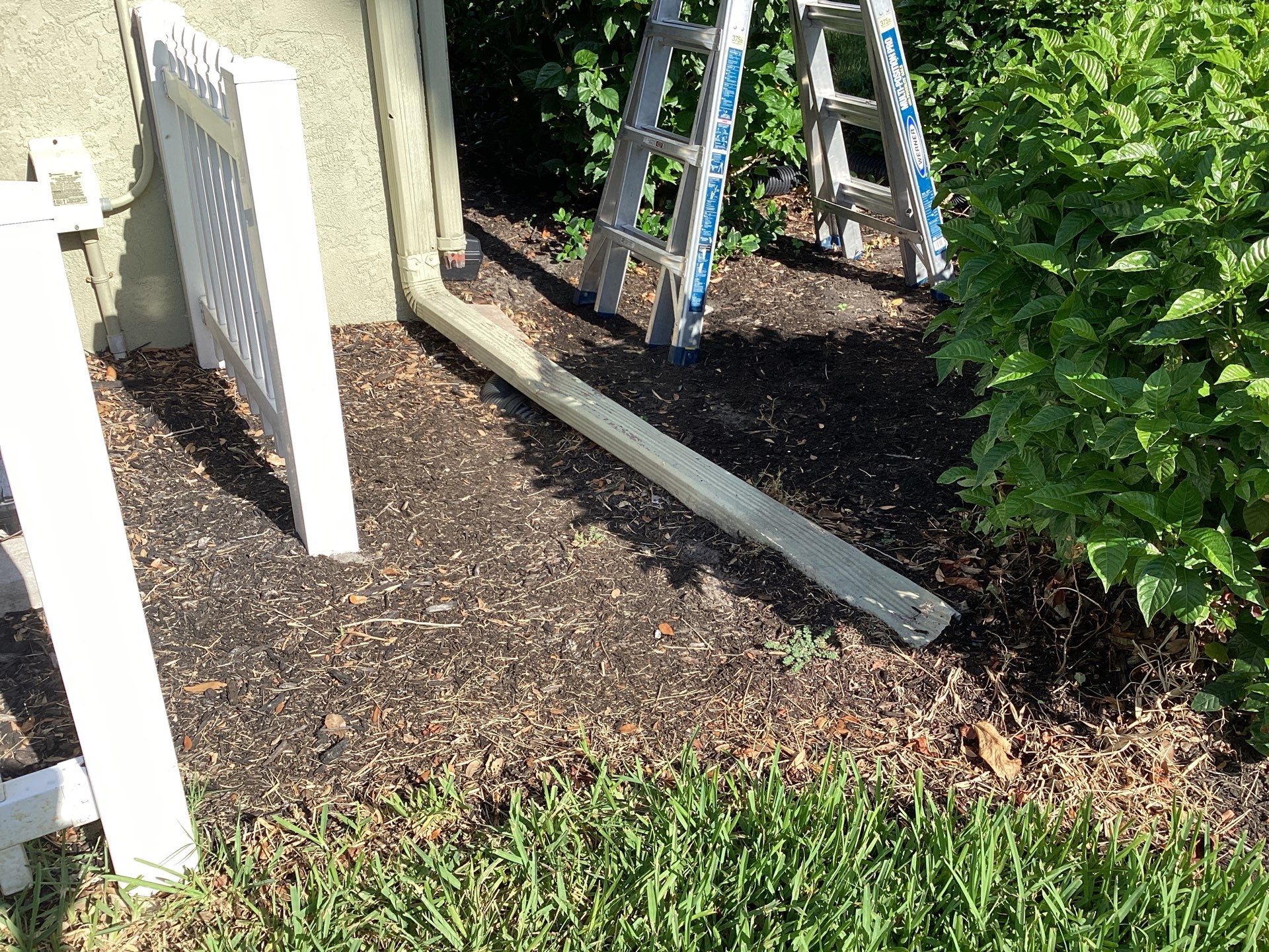 White Gutter Installation in Sarasota FL by Gutter Professors
