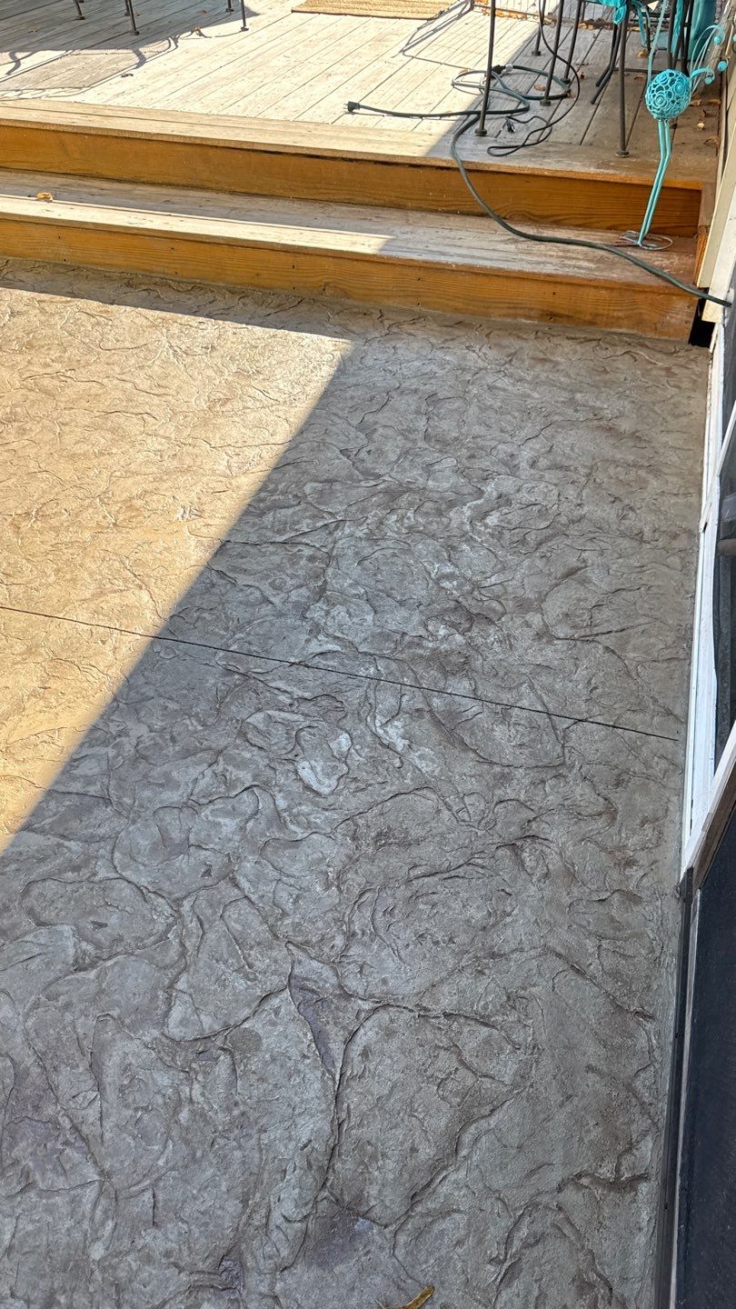 Oxford slate stamped patio  by NG Masonry & Construction LLC