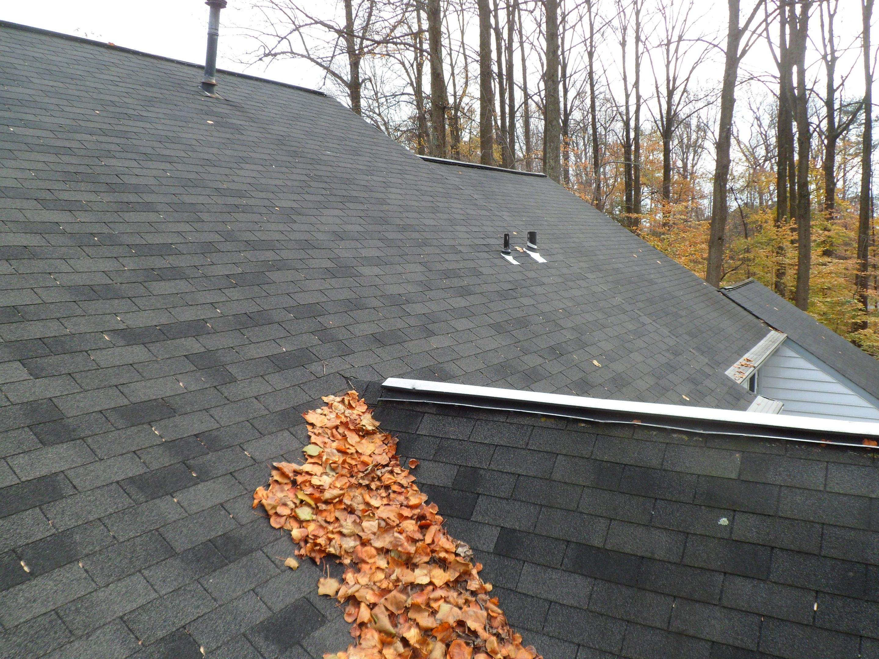 Residential Roofing Installation using Charcoal Black by Alpha Design Services