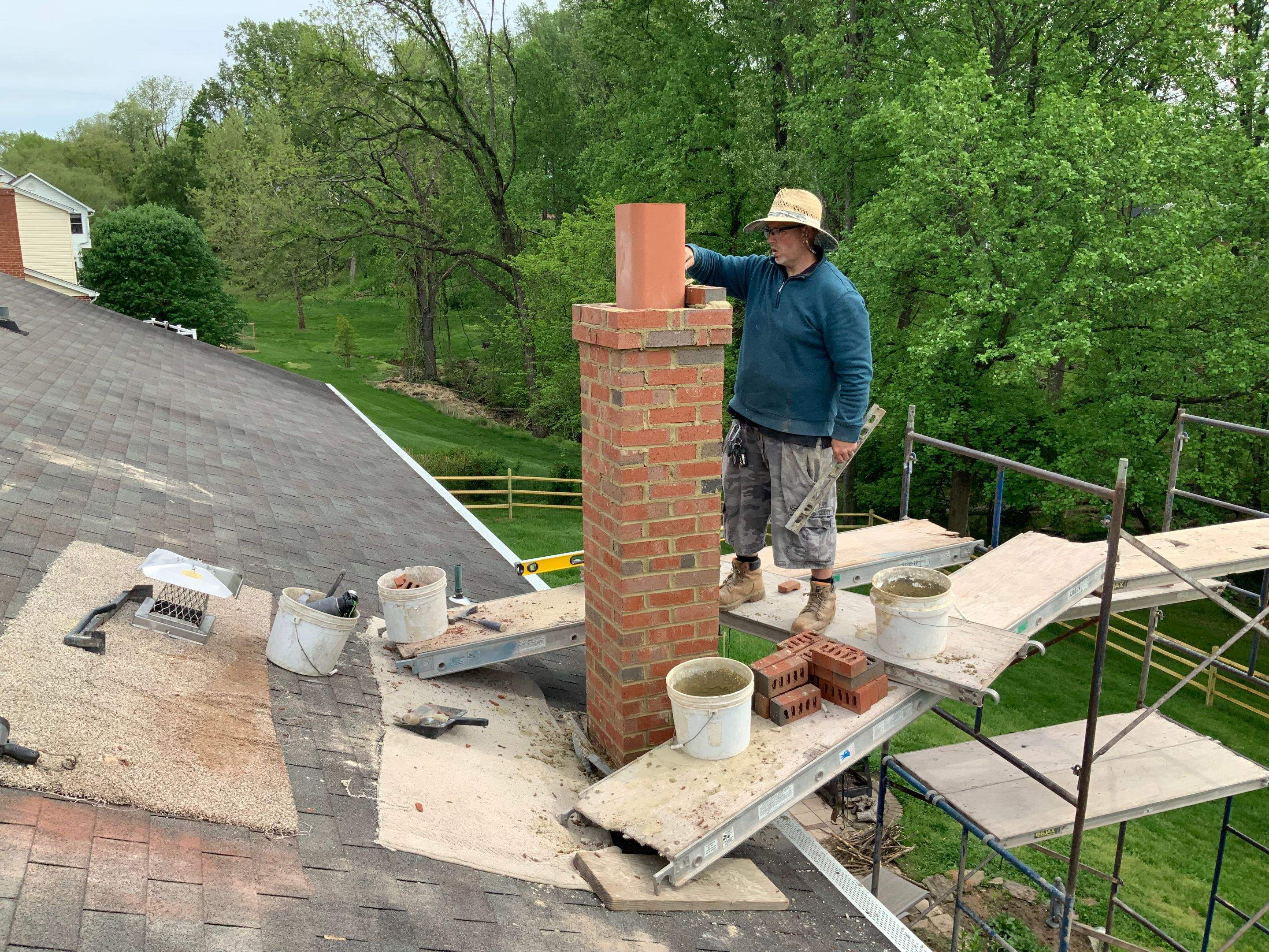 Residential Roofing Installation using Landmark Shingles Color Weatherwood by Alpha Design Services