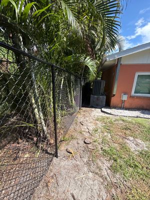 Black Chain Link Fence Installation and Site Clearing in Nokomis