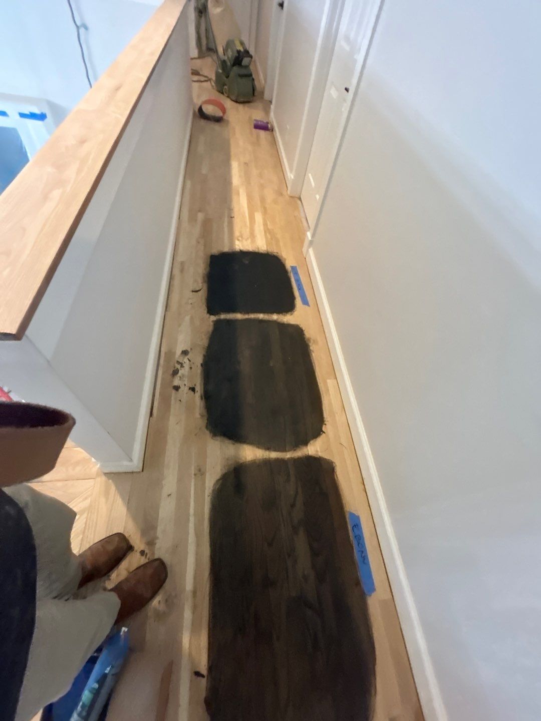 Updated staircase and hallway by Footprints Floors of Nashville