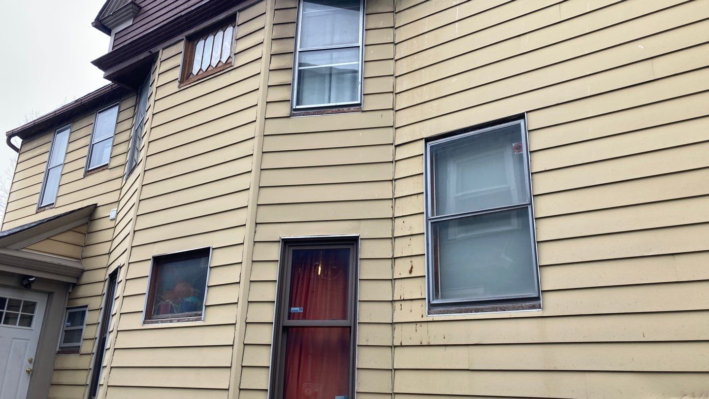 James Hardie Siding on Antique Home by Absolute Roofing and Construction