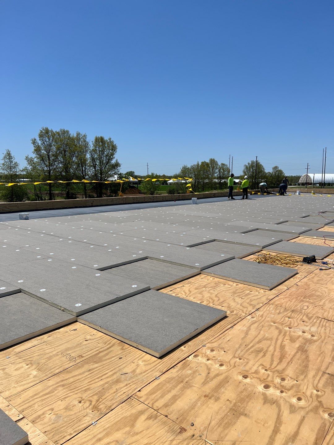 Commercial Roofing Installation using 60 mil rubber roof  by Nitro Roofing and Construction