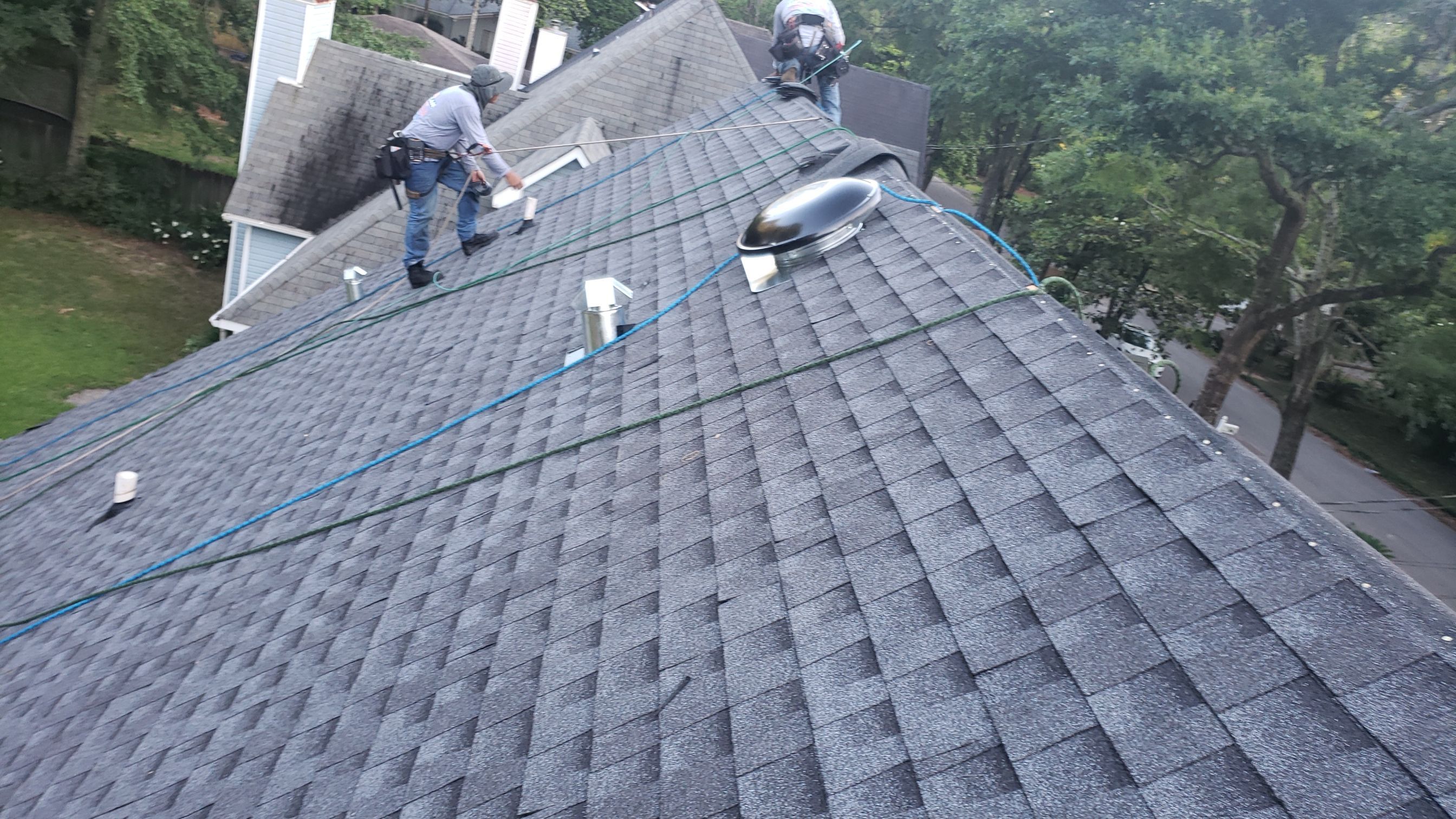 Residential Roofing Installation using Roof Replacement by American Roofing & Construction LLC