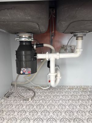 Garbage disposal install with water line repair