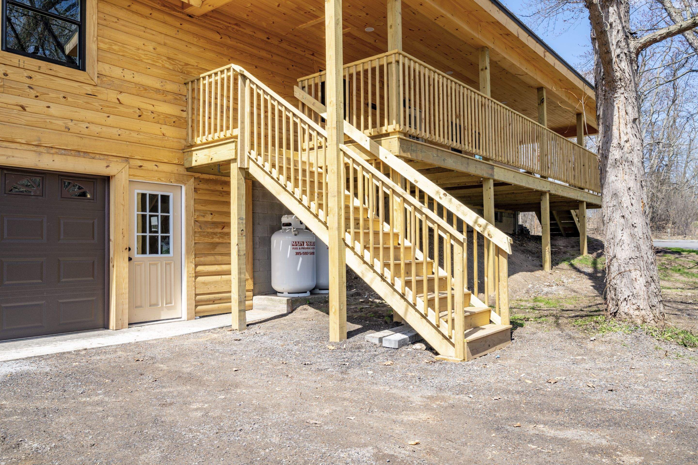 New Addition to Home using Log Cabin Siding  by Horst Custom Homes 