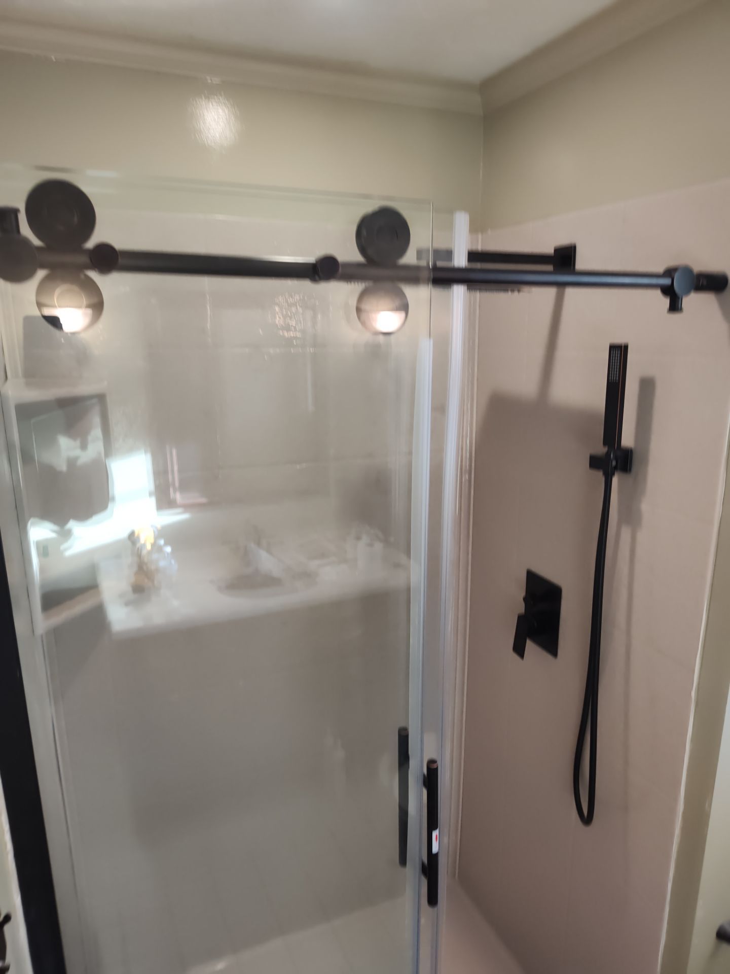 Bathroom Remodel using Onyx by Cornerstone Home Builders, LLC