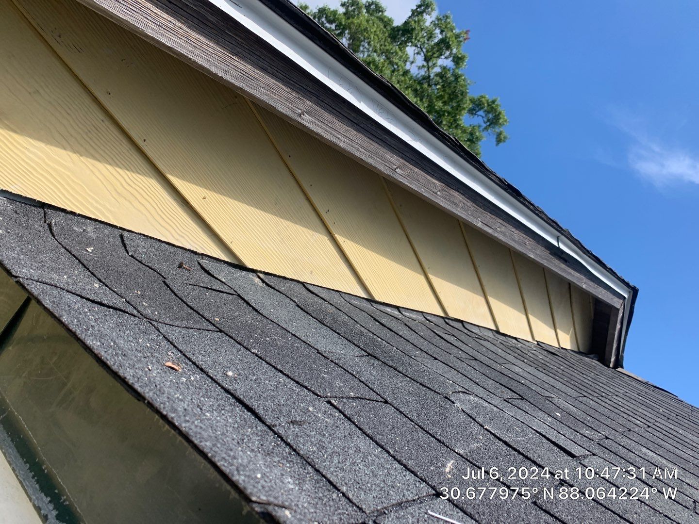 Siding Repair using Roof repair by American Roofing & Construction LLC
