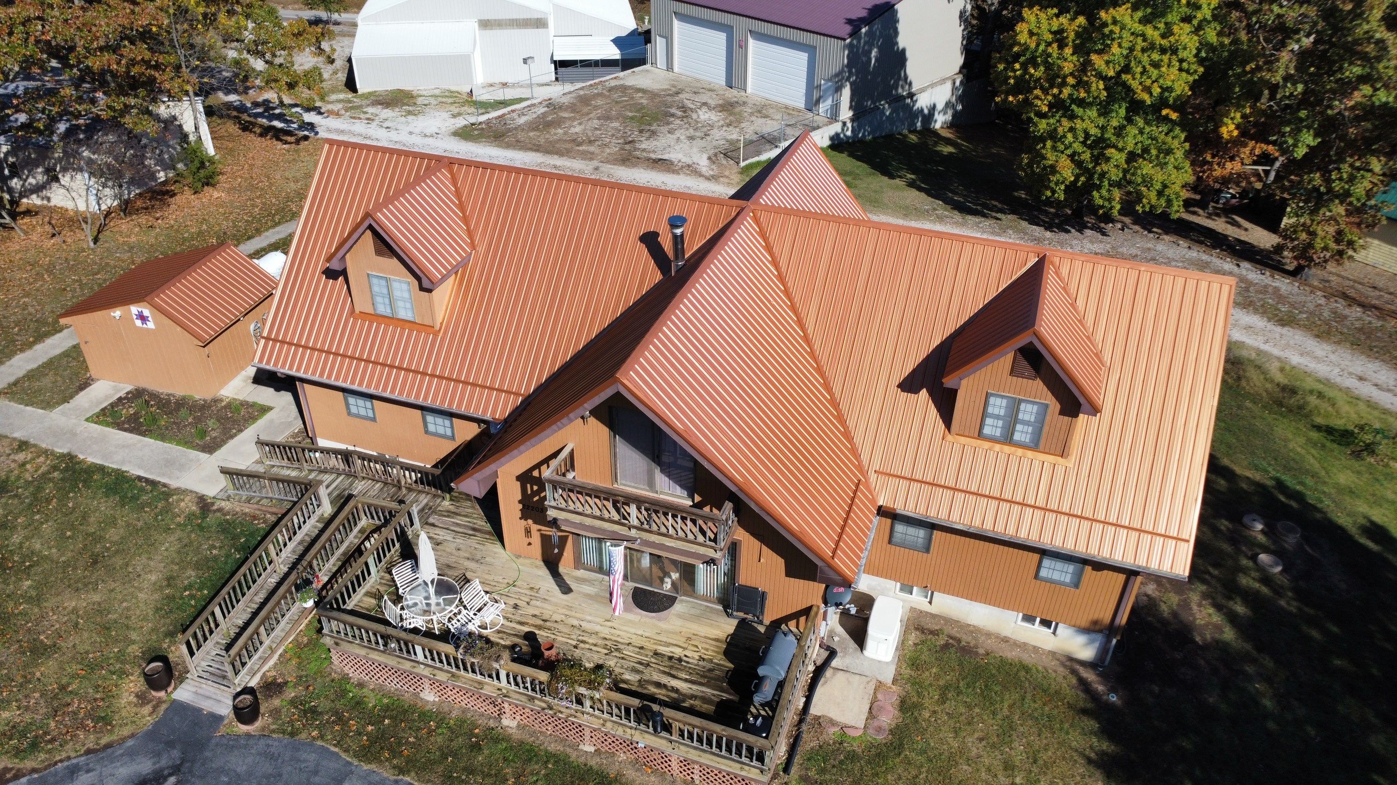 Residential Roofing & Snowguard Install - 29 Gauge G-Rib Metal - Color Copper Metallic  by Titan Commercial & Residential Roofing 