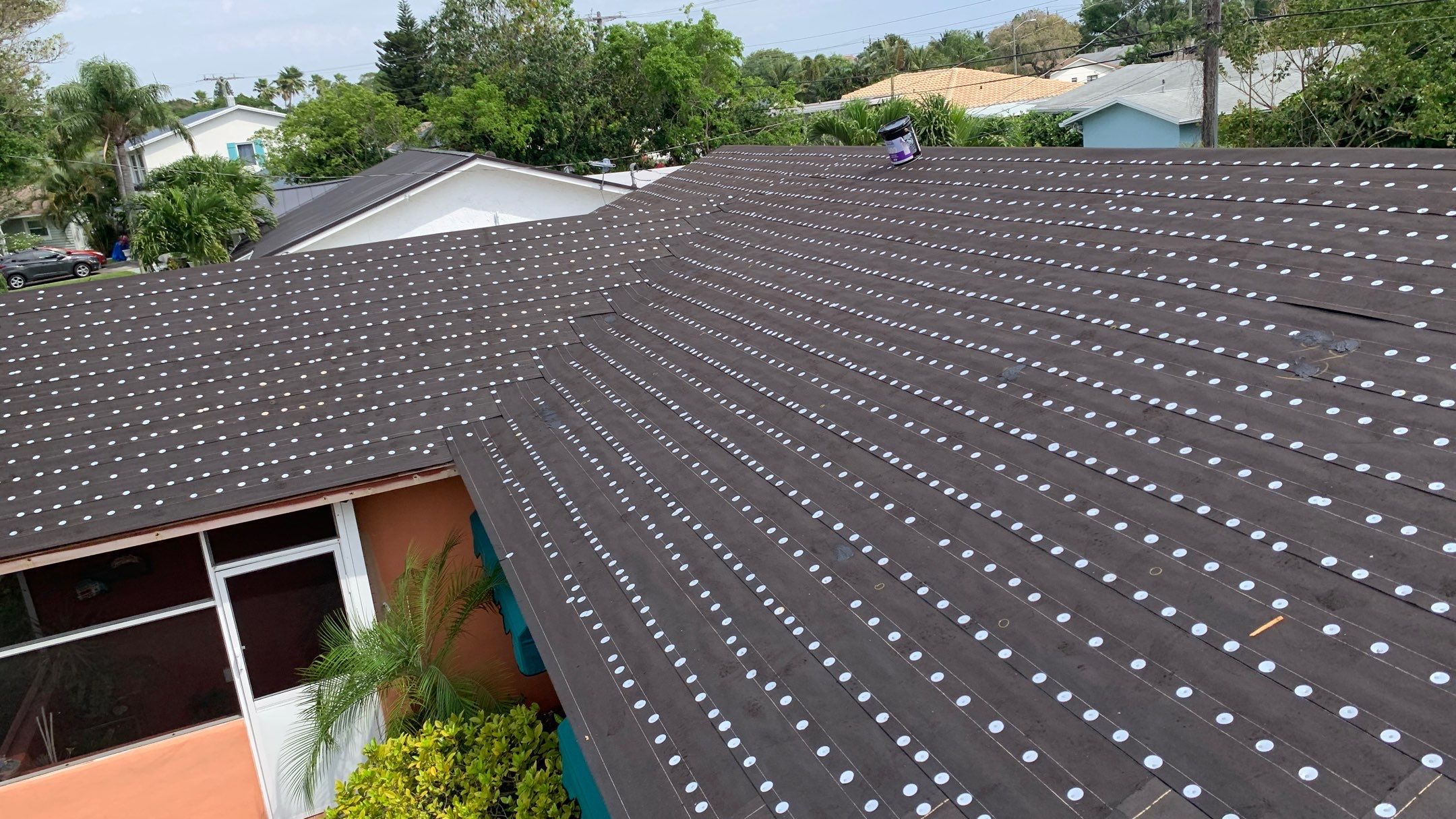Residential Roofing Installation using 1" Nail strip metal roof by BLUES BROTHERS ROOFING