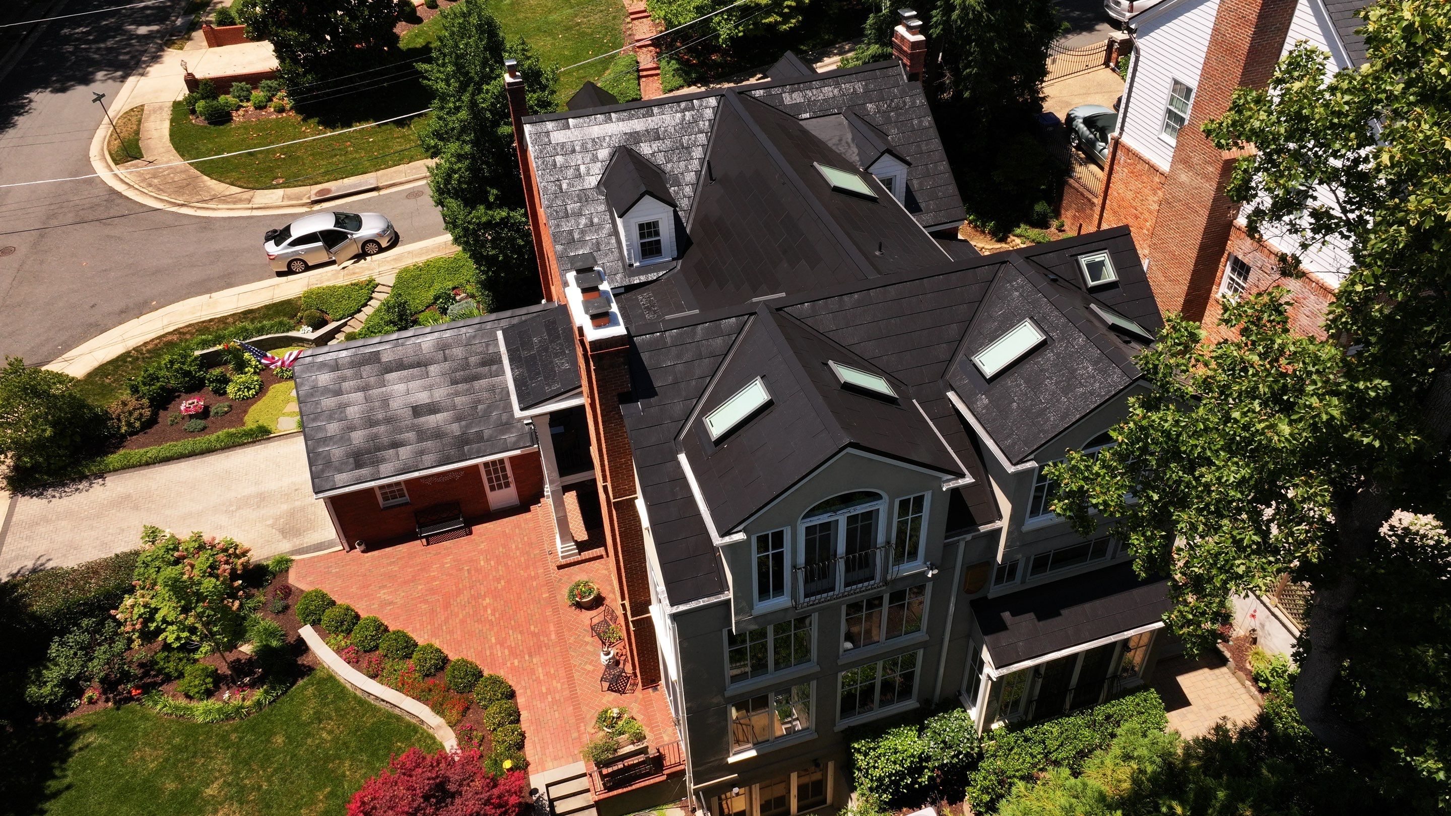 Sleek Tesla Solar Roof + Powerwall Installation | Alexandria, VA by American Home Contractors