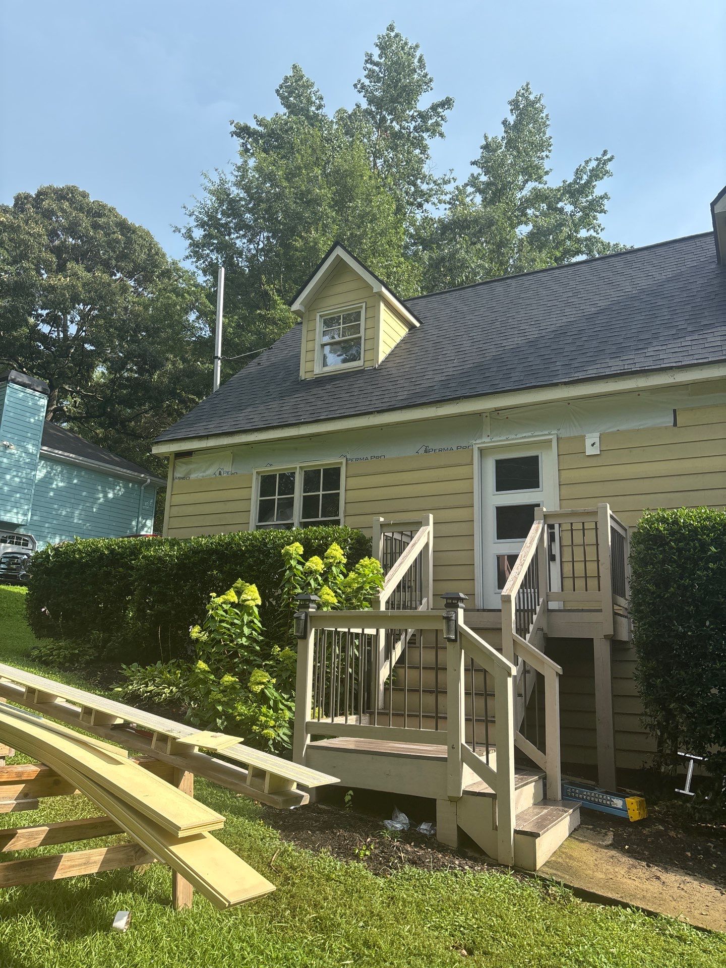 James Hardie Siding Install, Rotten Wood and Gutter Replacement and Exterior Painting by Nelson Exteriors 