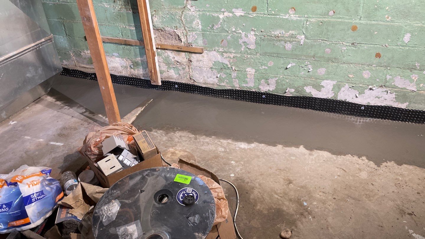 Interior Drain Tile for a South Minneapolis Basement by Waterproofing Northeast