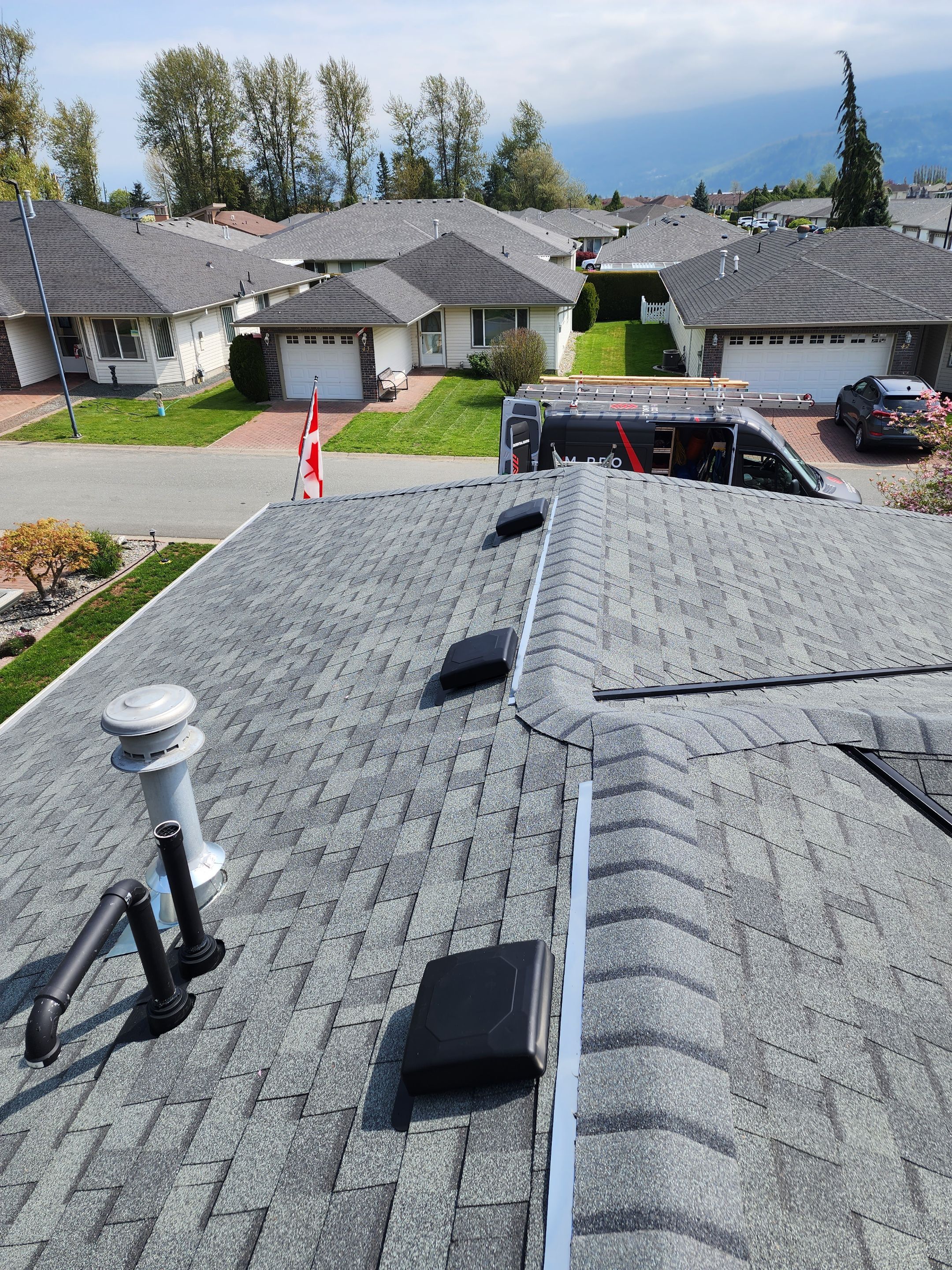 Residential ReRoofing Installation using OC Estate Gray Shingles by Top Notch Roofing Inc