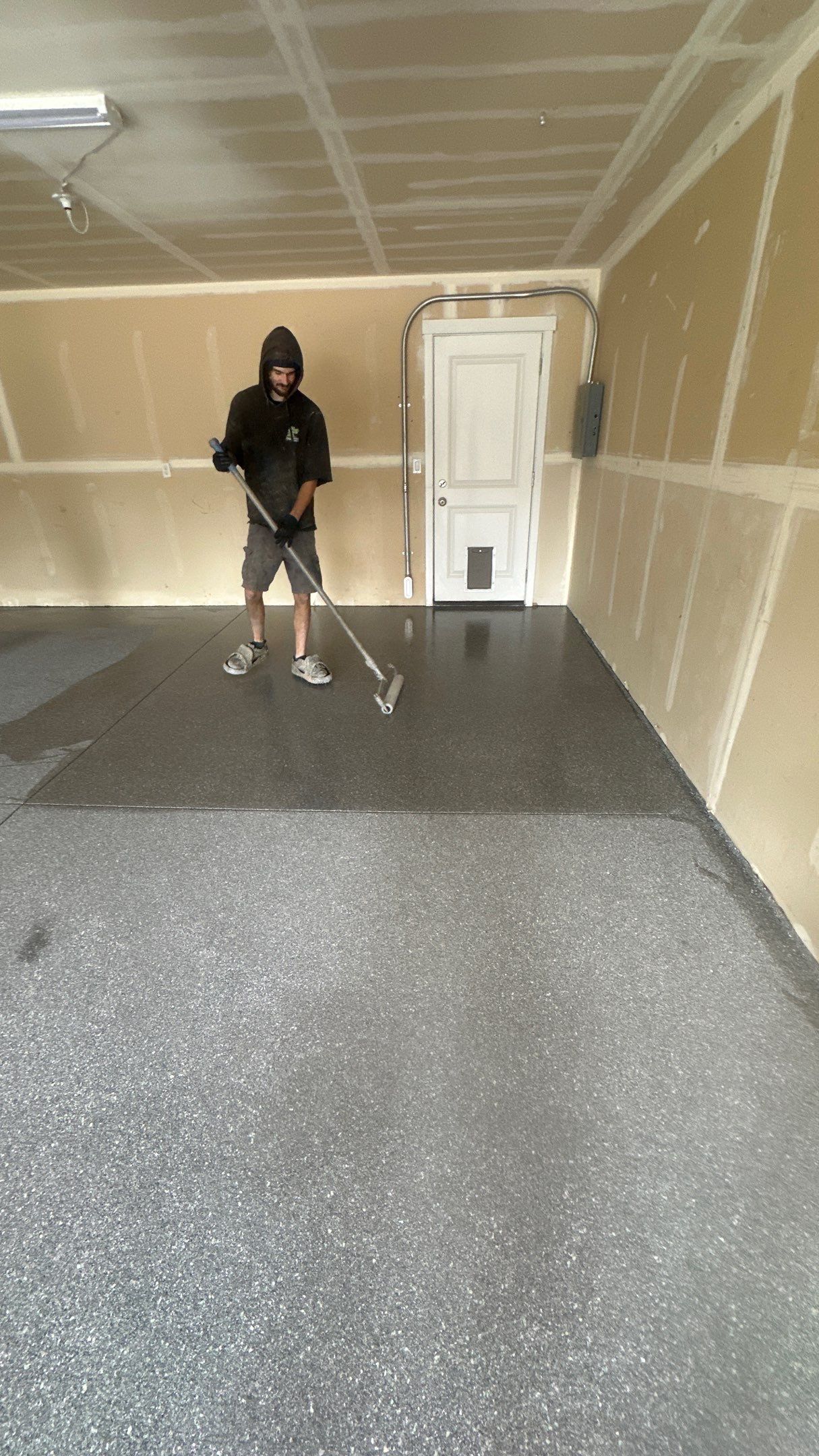 Garage Floor Coating Installation in Post Falls with Canfield Hybrid Flakes by Croc Coatings, LLC