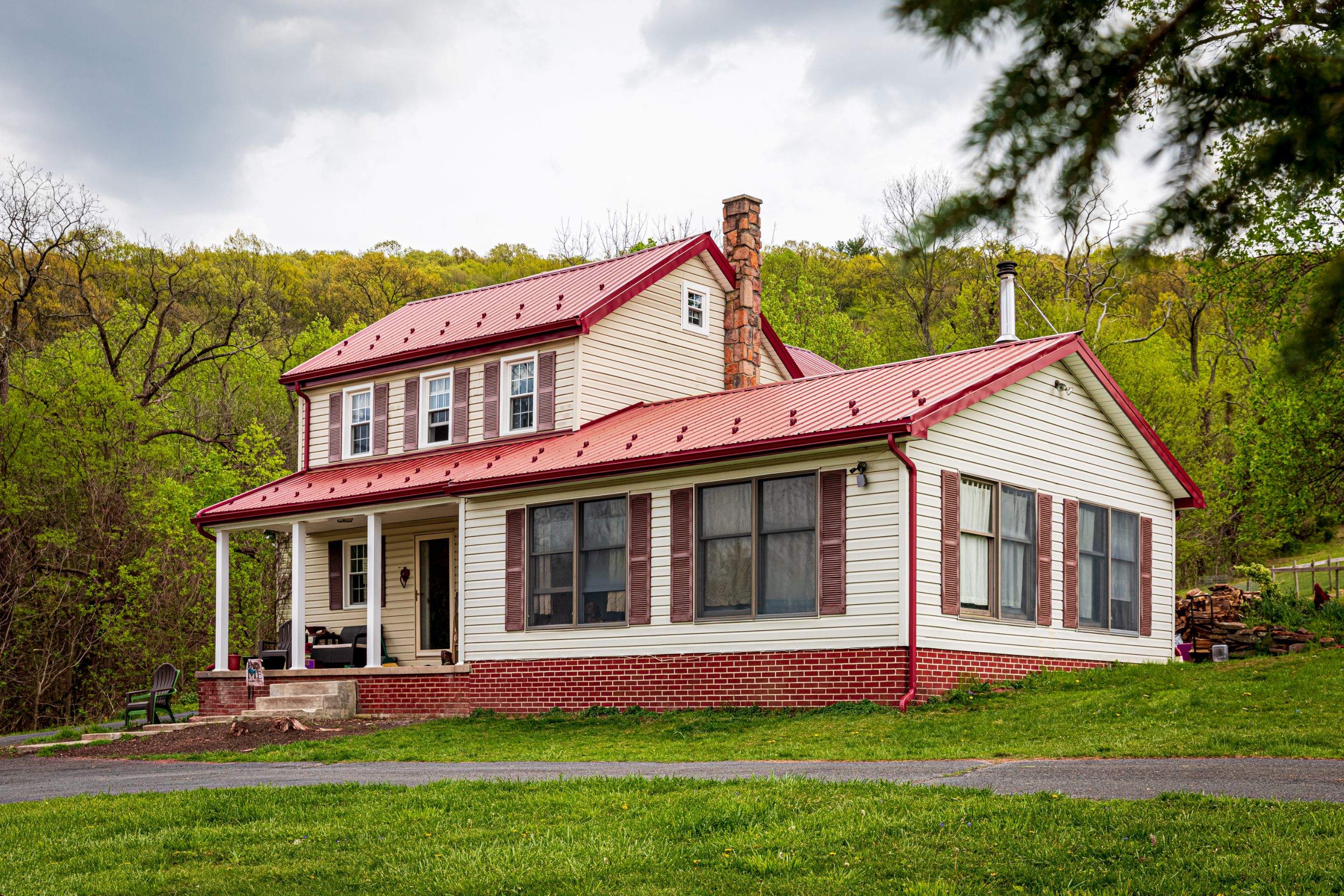 Metal Roof-coloniel red- and new siding by Esh Builders