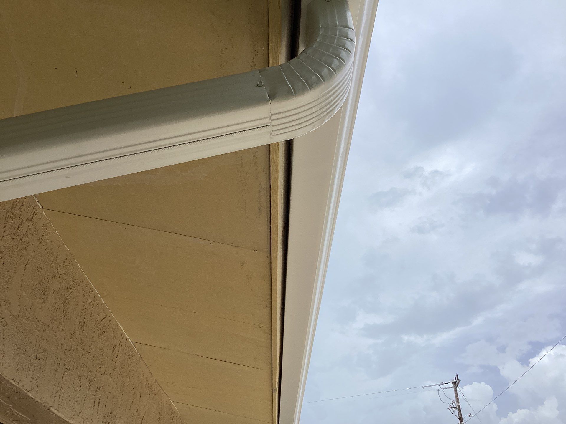 6-Inch Seamless Gutter Installation in Sarasota FL by Gutter Professor by Gutter Professors