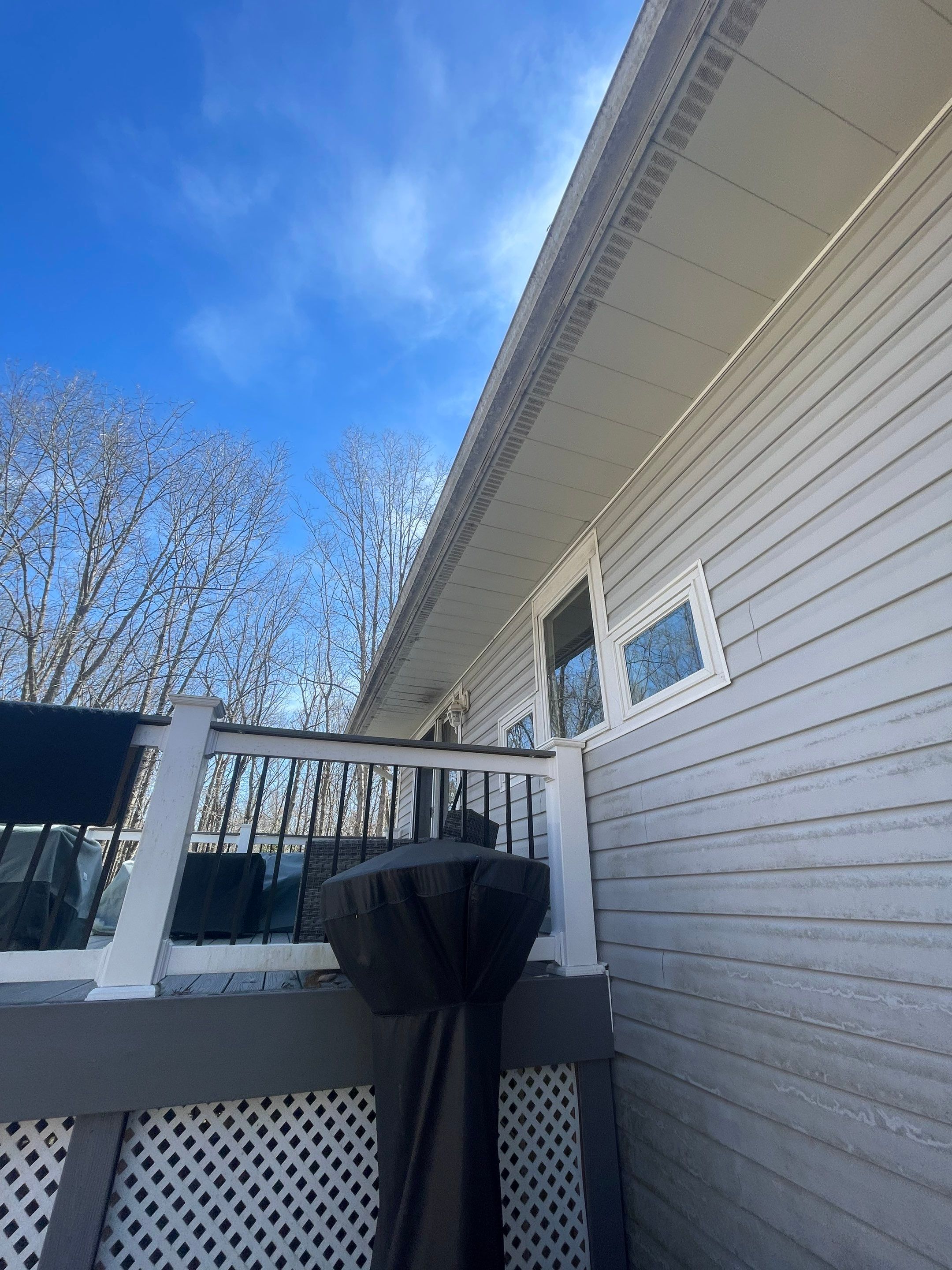 Pressure treated wood deck cleaned by SJ Exterior