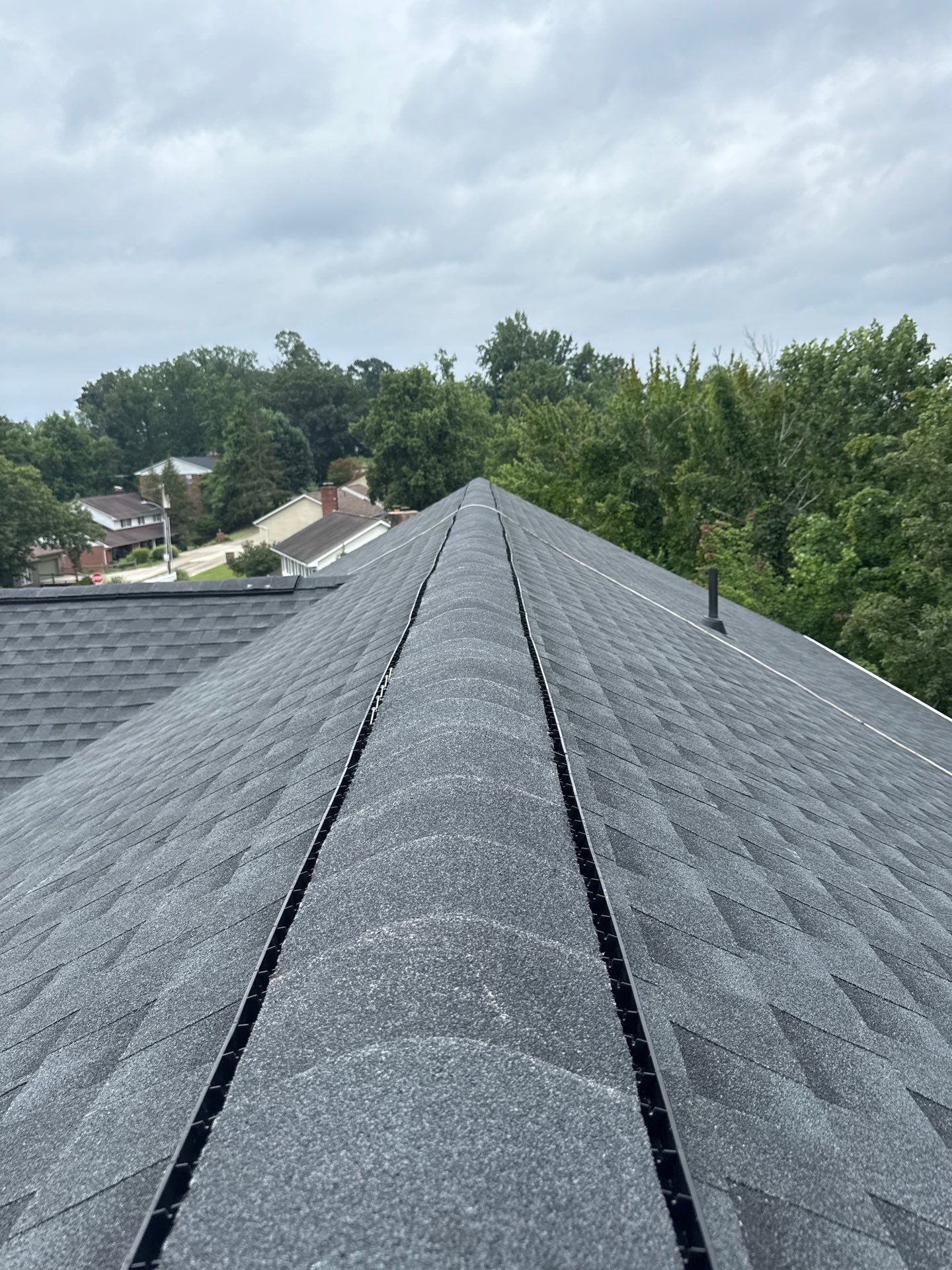 Residential Roofing Installation using GAF Timberline HDZ Charcoal by Rainstoppers Roofing
