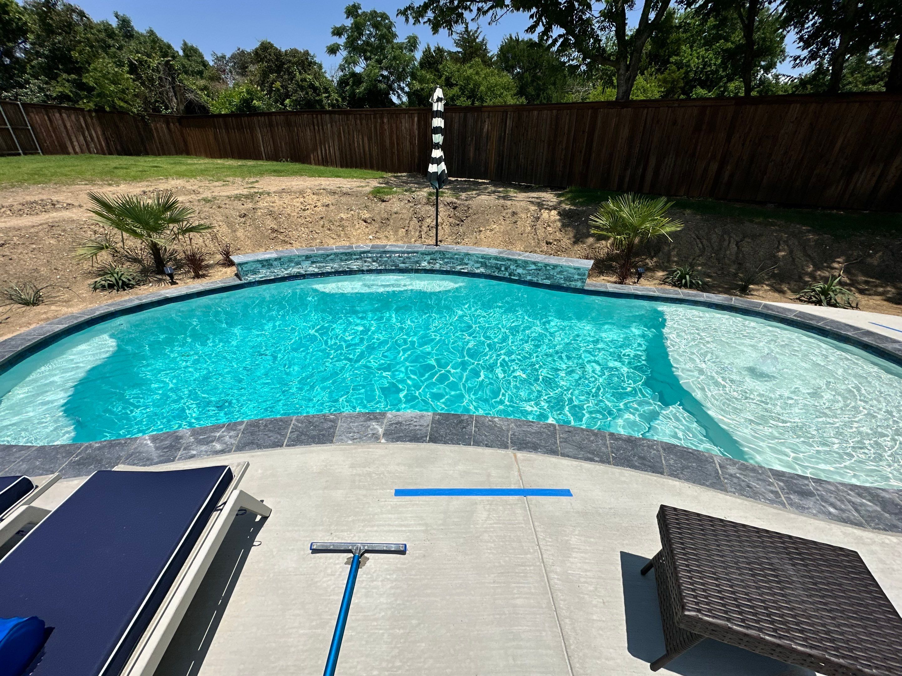 Rowlett Freeform Pool with Water Feature by Pinnacle Pools and Spas - DFW