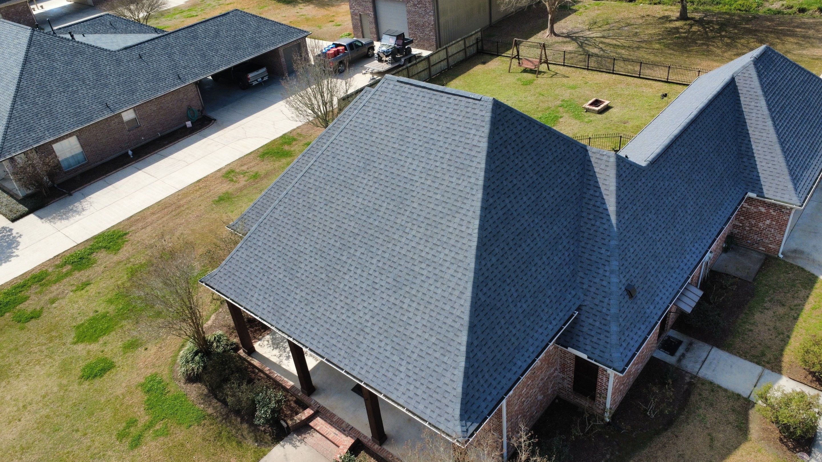 Residential roof installation in Plaquemine, LA using Atlas Pinnacle Pristine Pewter shingles  by Top Team Roofing & Construction