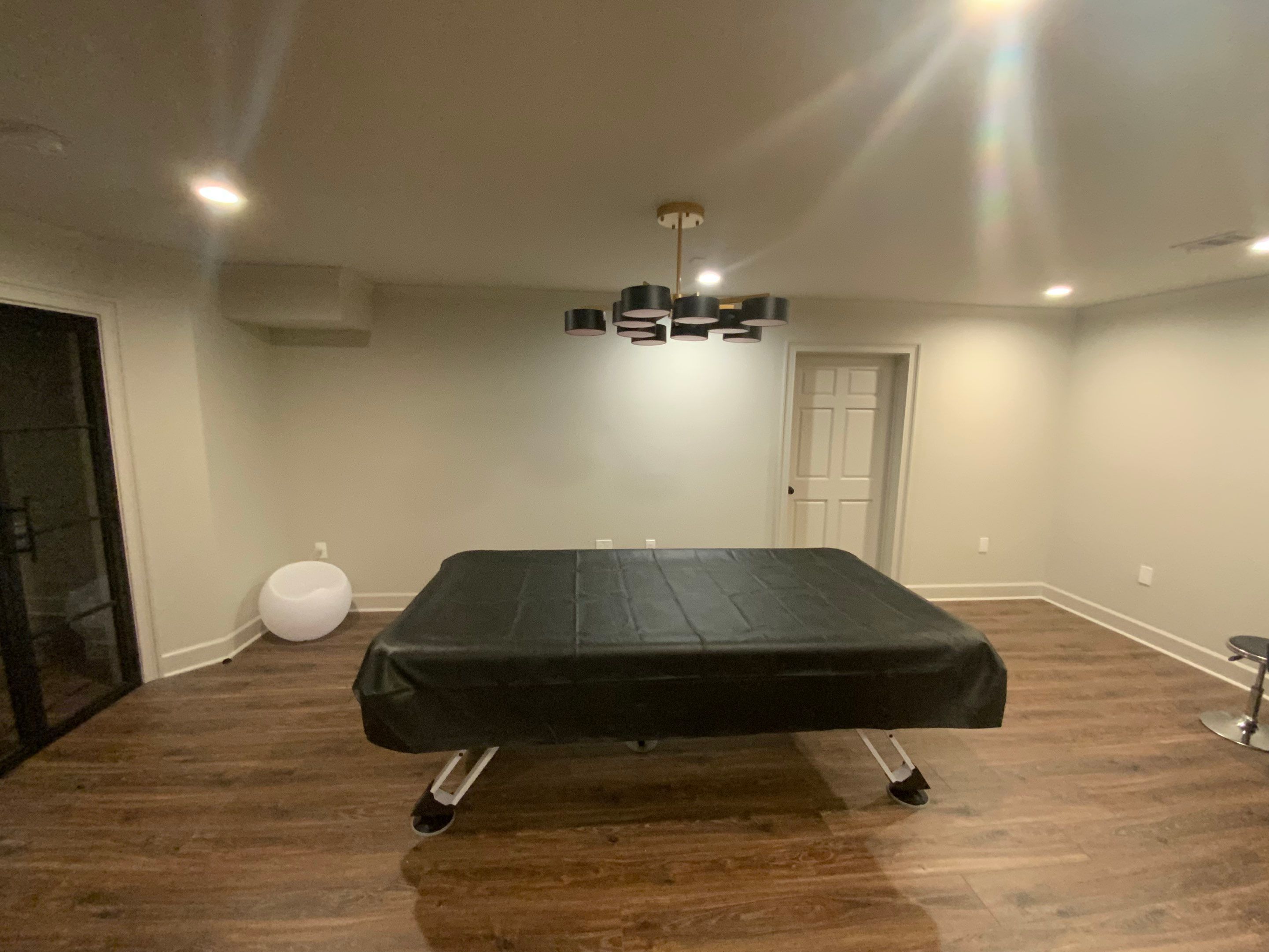 Finished Basement Renovation Featuring Home Theater and Custom Wine Cellar by Swift Home Renovations