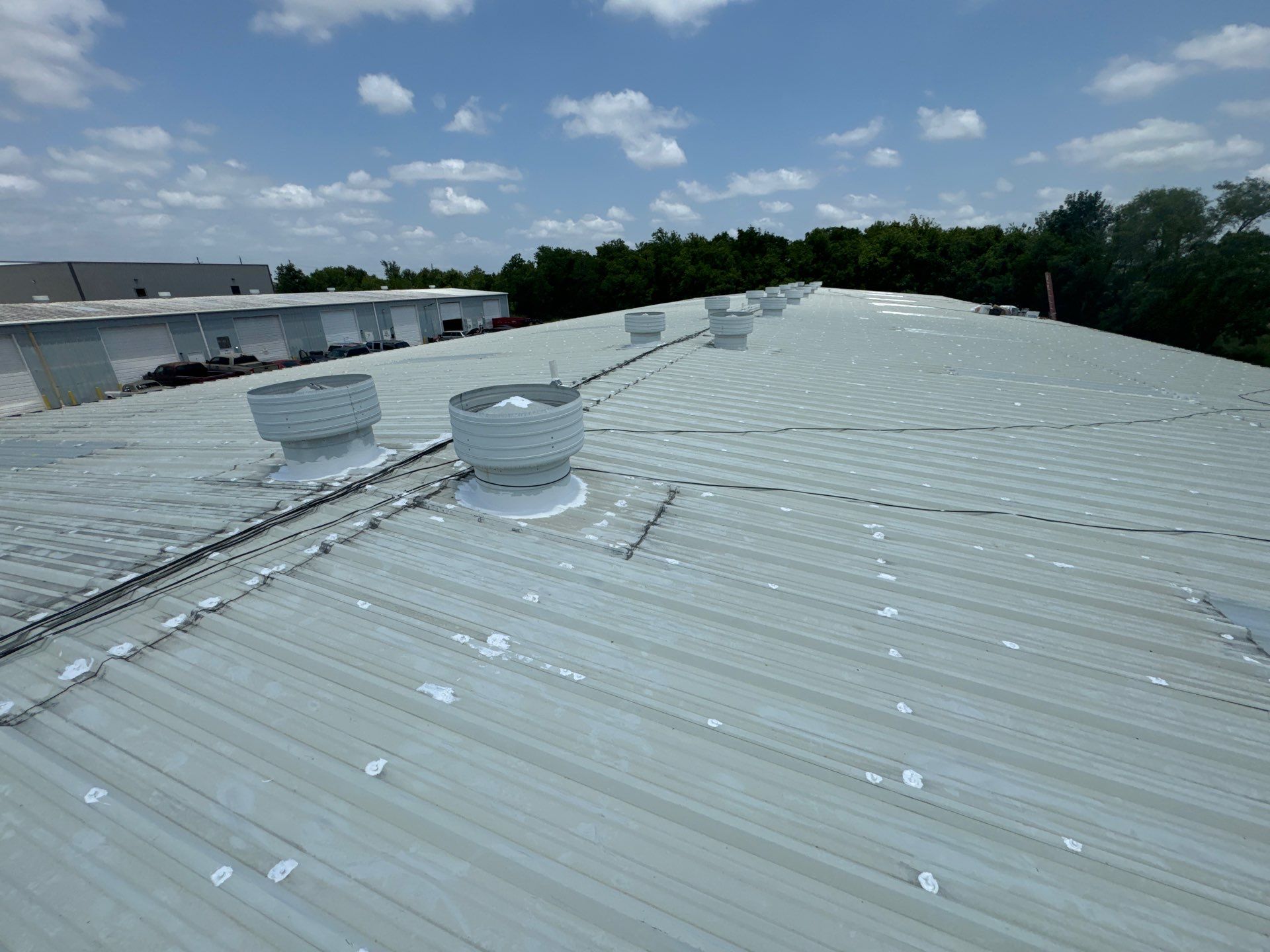 Metal Roof Maintenance- Skylight Installation  by Associates Roofing Unlimited 