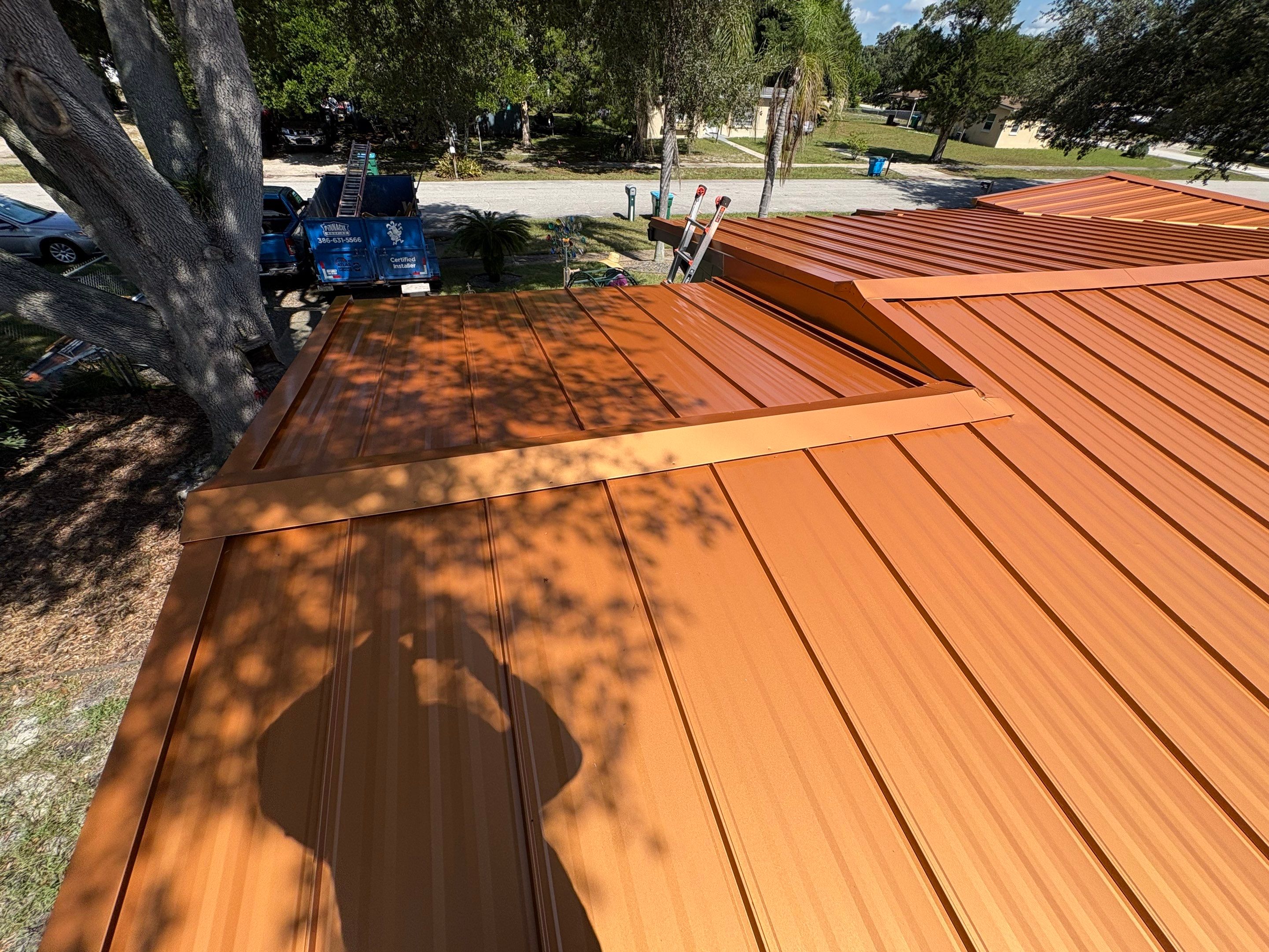 Standing Seam Metallic Copper Metal Roof Replacement in Deltona by Pinnacle Roofing Group