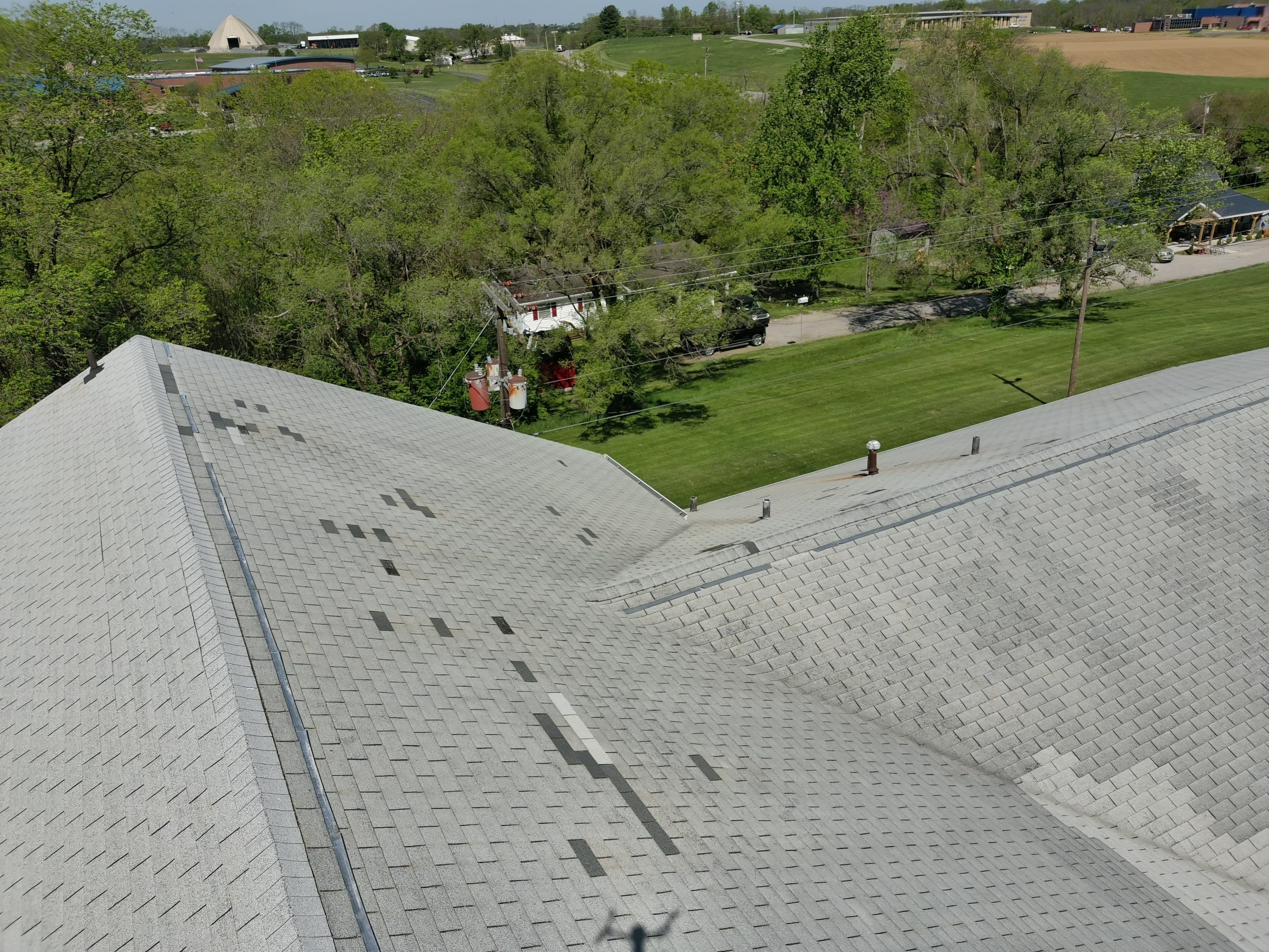 Commercial Roofing Installation using Performance Shingles by Mr. Roofer